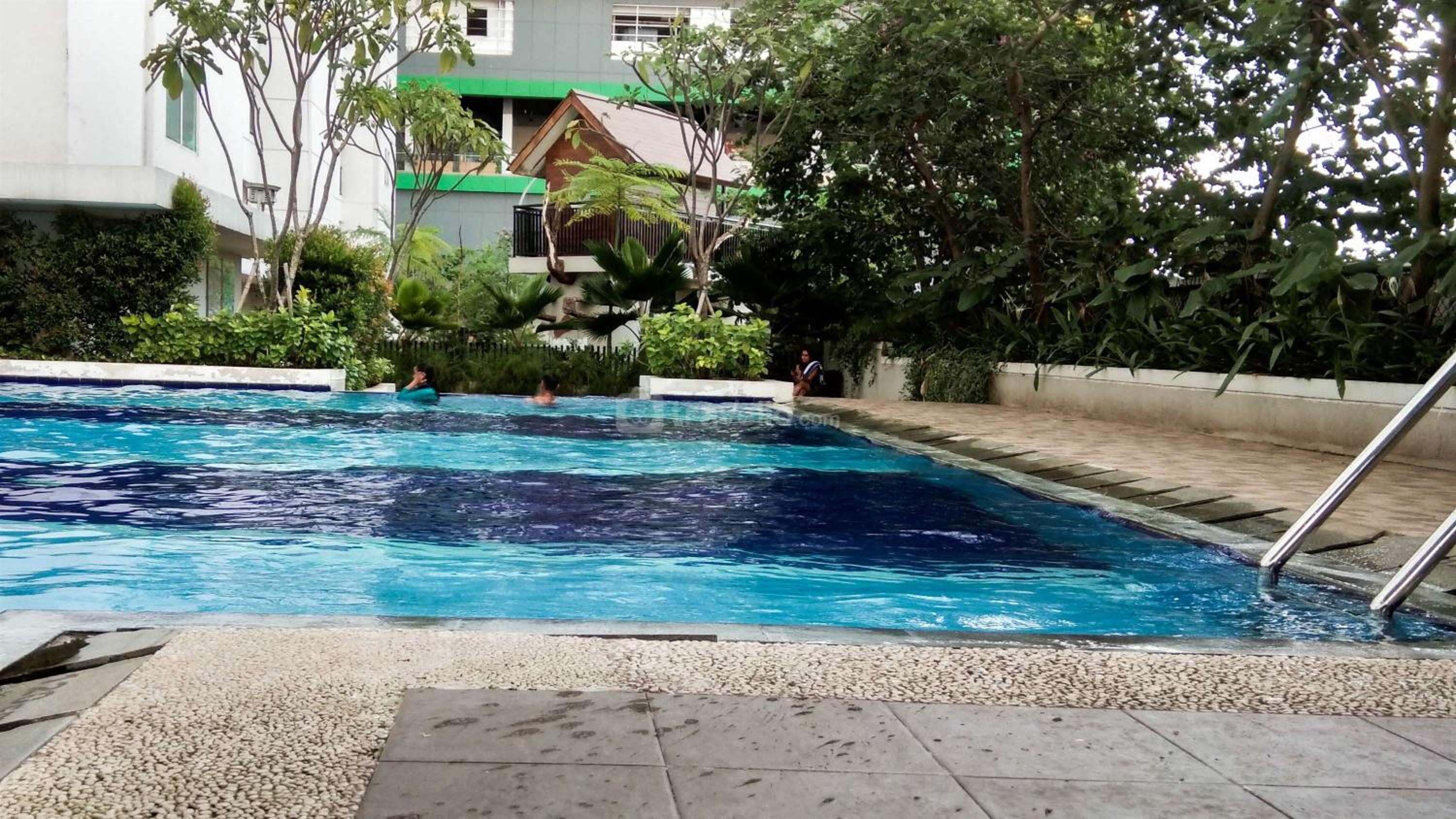 Minimalist and Warm 1BR at Bassura City Apartment By Travelio