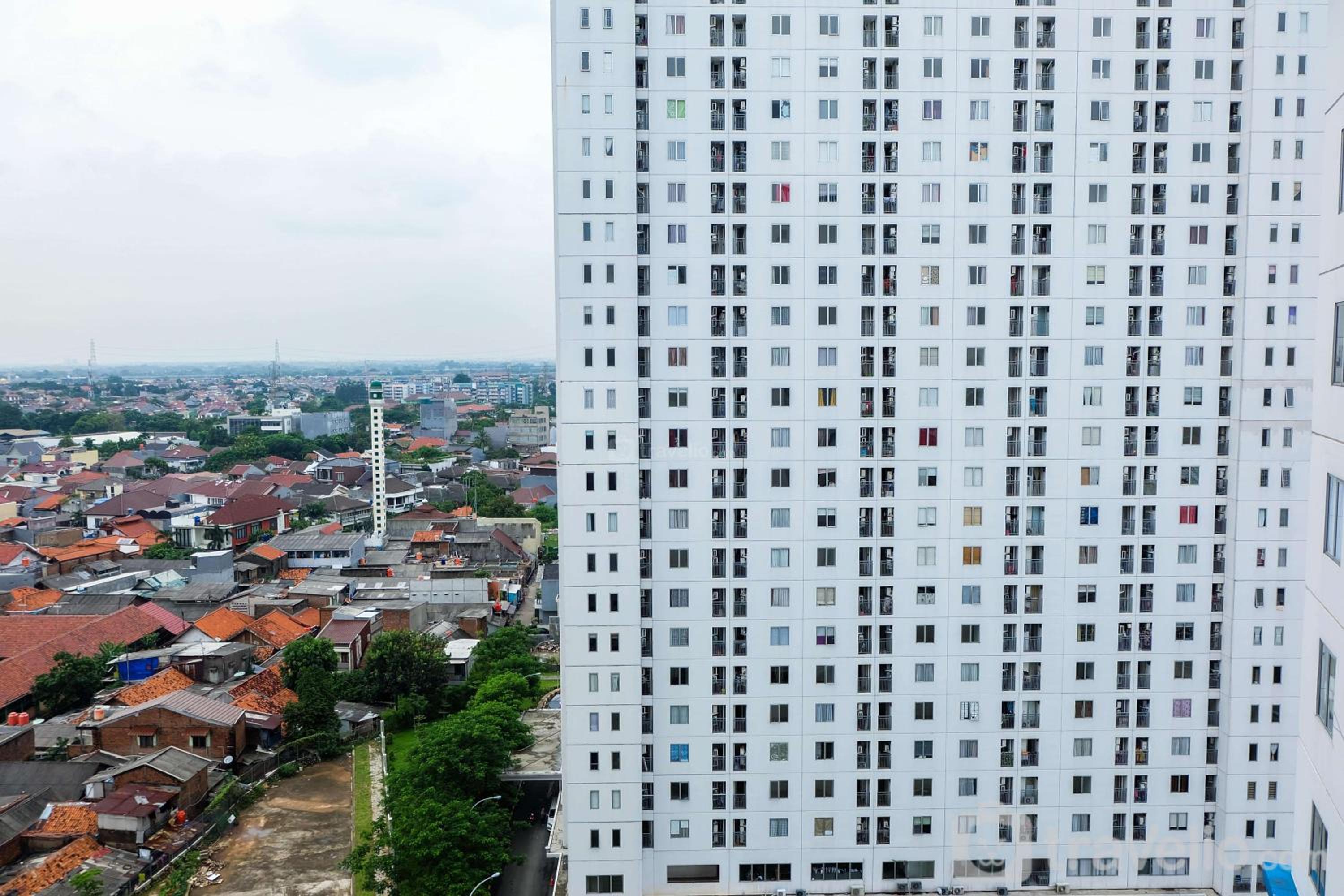 Strategic and Cozy 2BR Bassura City Apartment By Travelio