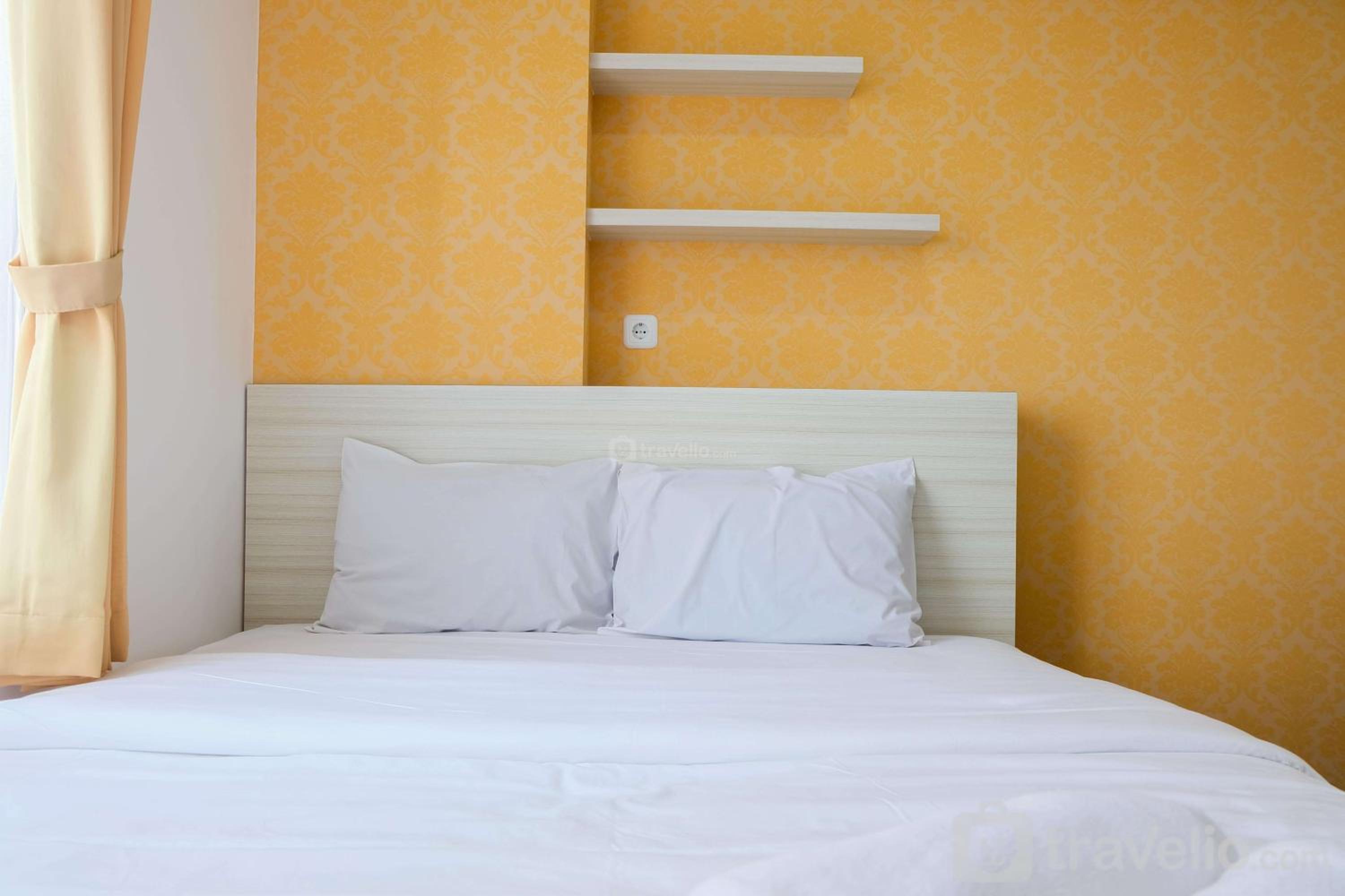 Strategic and Cozy 2BR Bassura City Apartment By Travelio