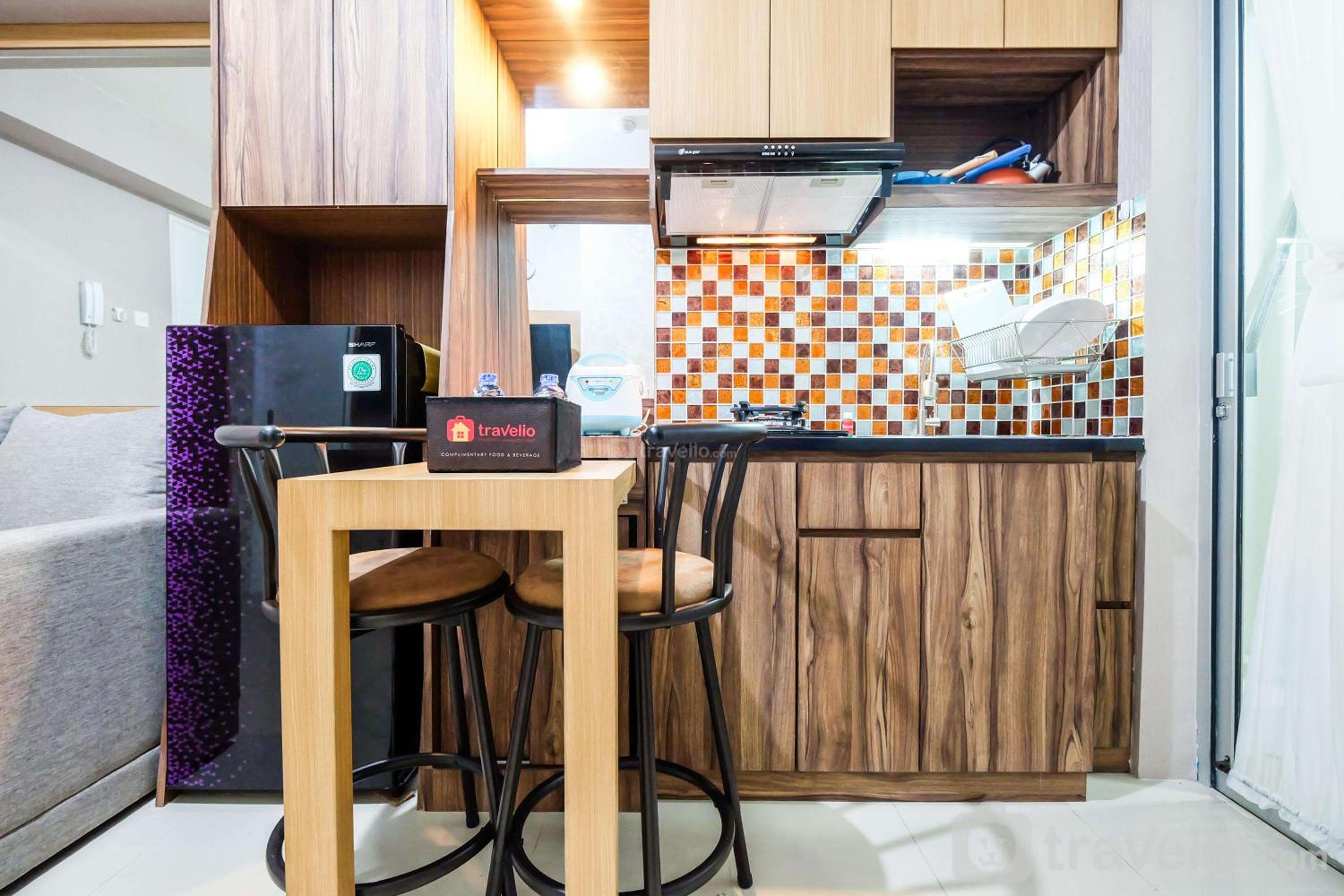 Classic 2BR Bassura City Apartment By Travelio