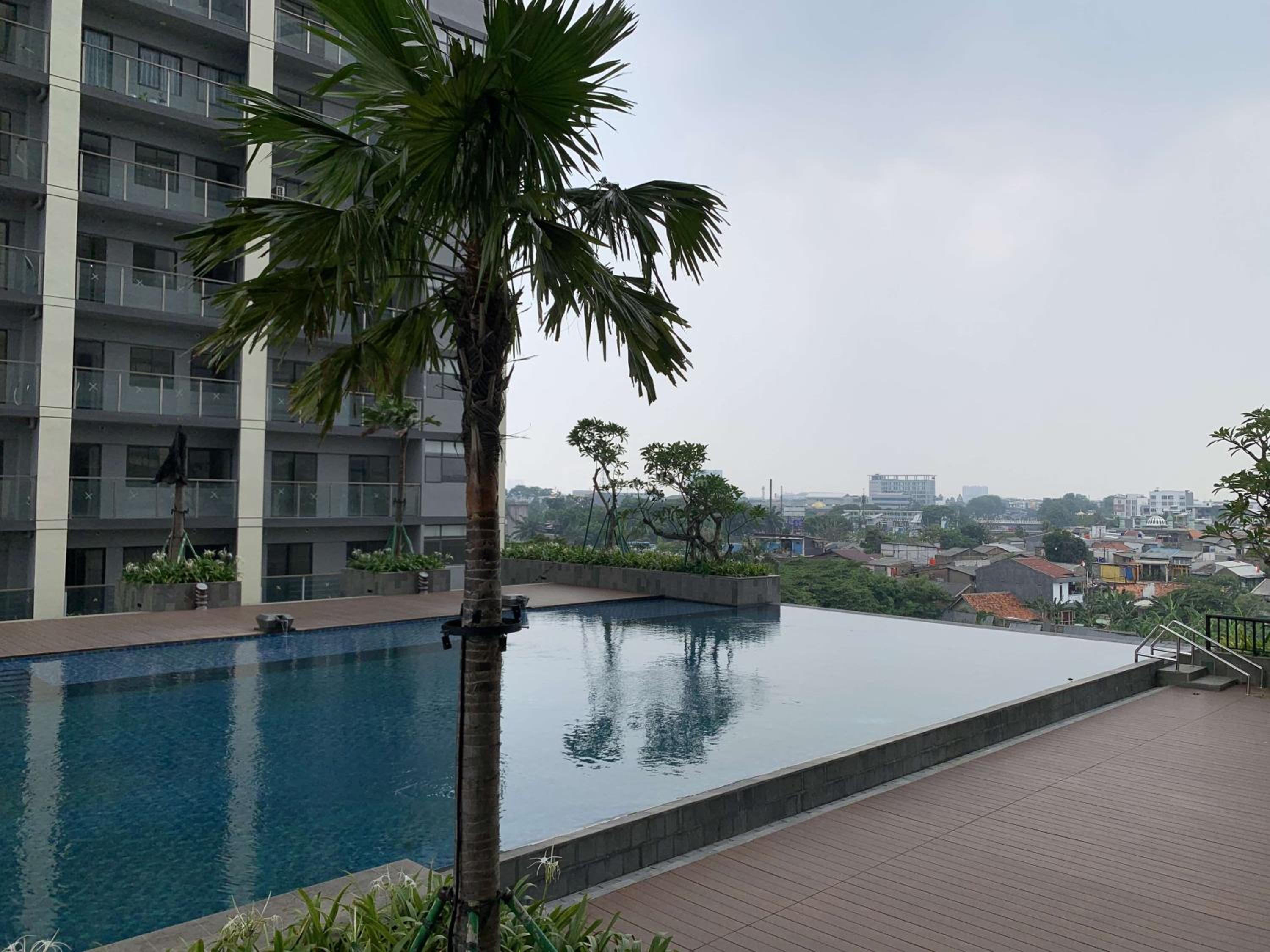 Comfort Stay 2BR at Daan Mogot City Apartment By Travelio
