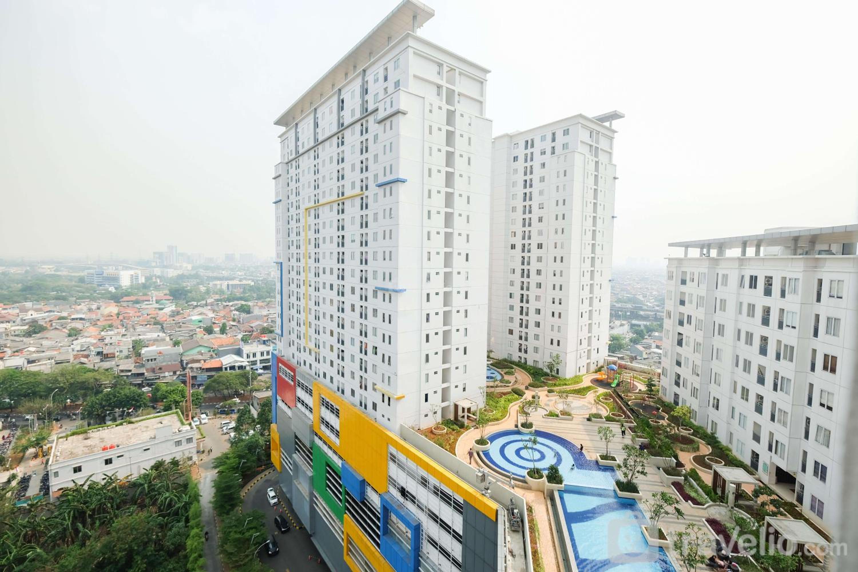 Cozy 2BR Bassura City Apartment By Travelio