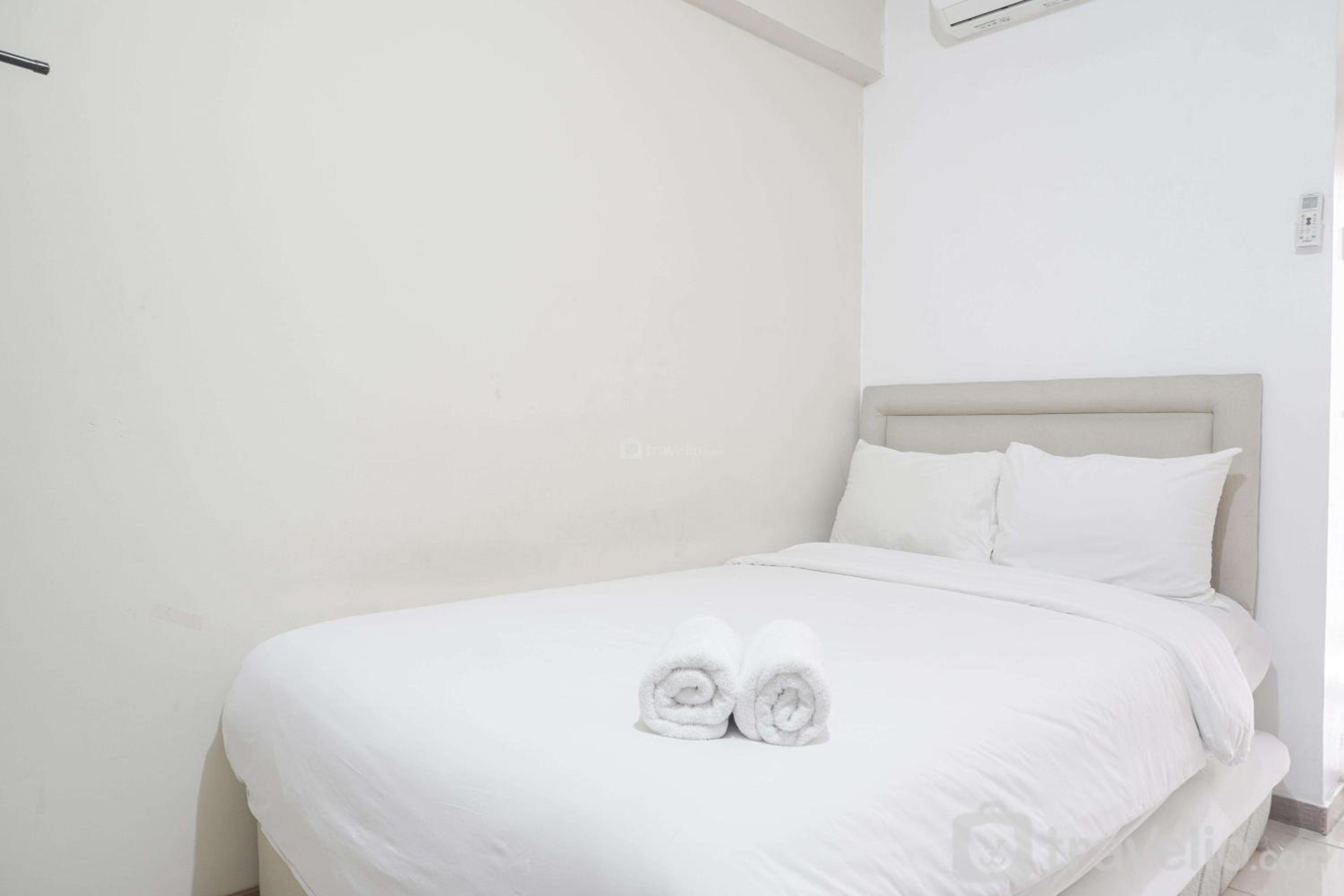 Restful and Simply Studio Apartment Green Palm Residence By Travelio