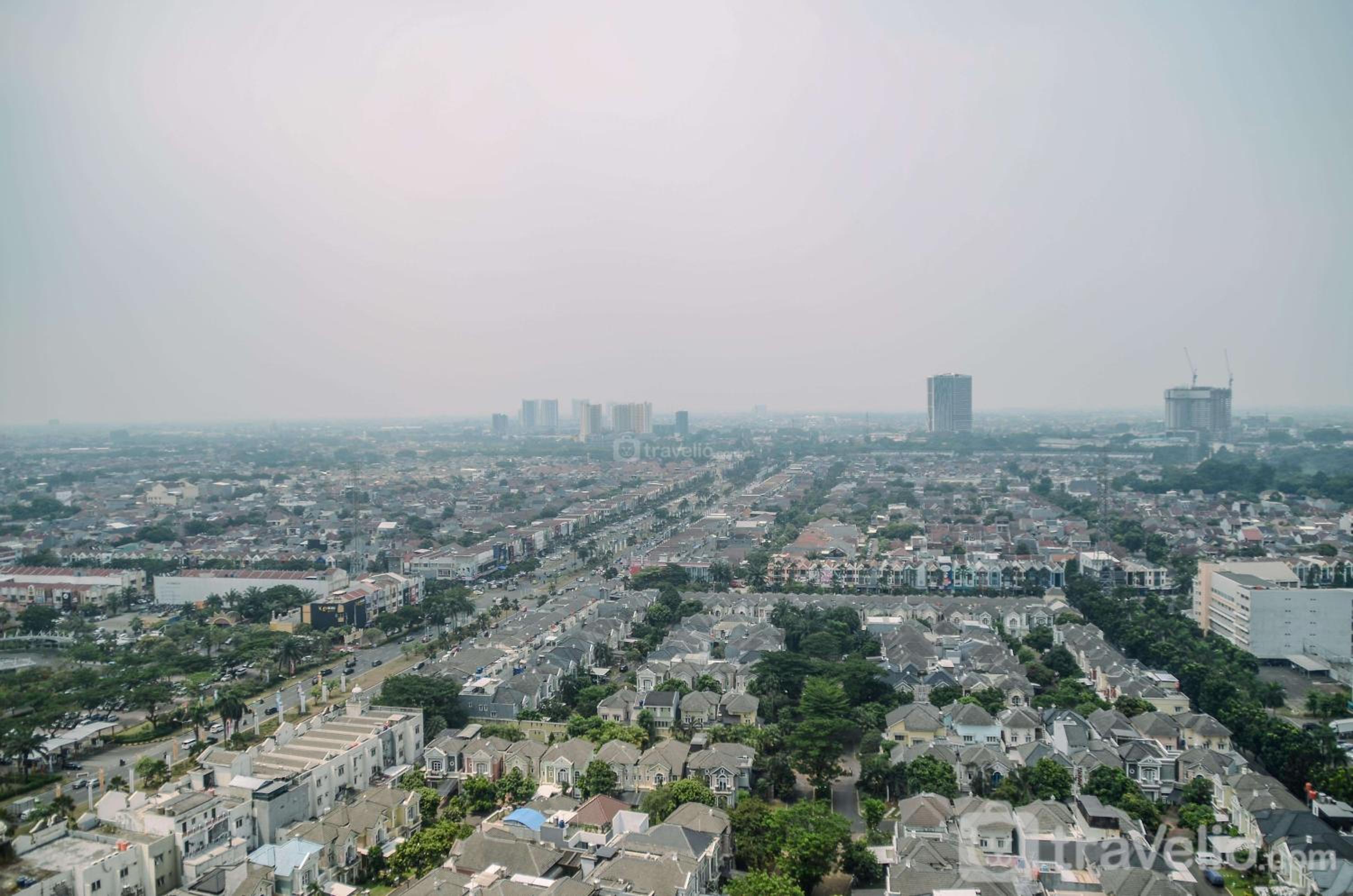 Best Deal 1BR at M-Town Signature near Summarecon Mall By Travelio view 2