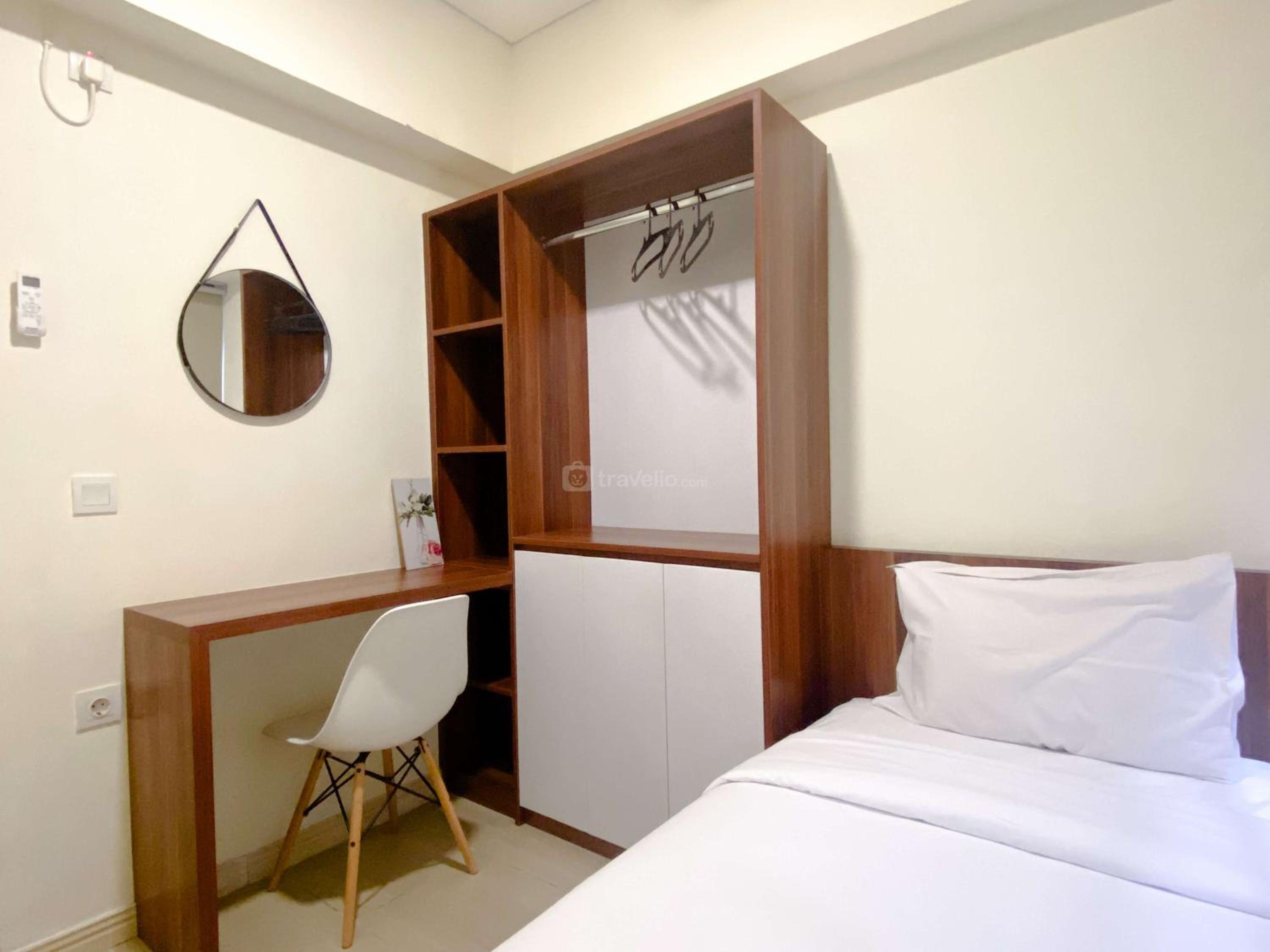 Spacious and Homey Apartment 2BR at Meikarta By Travelio view 4