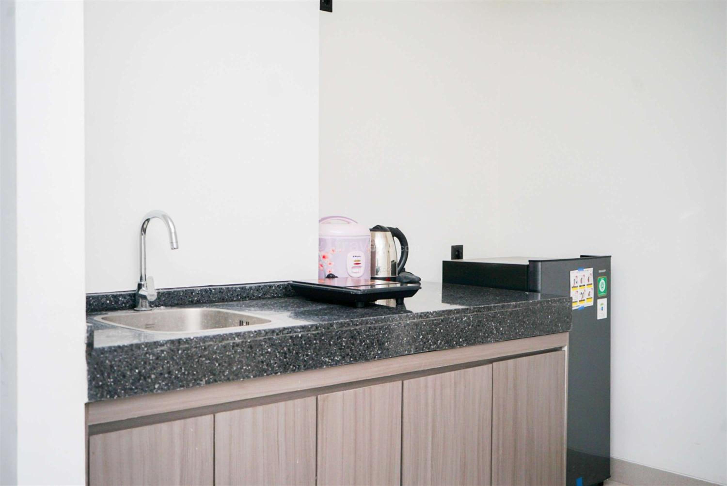 Nice and Restful 1BR Apartment Carstensz Residence By Travelio view 2