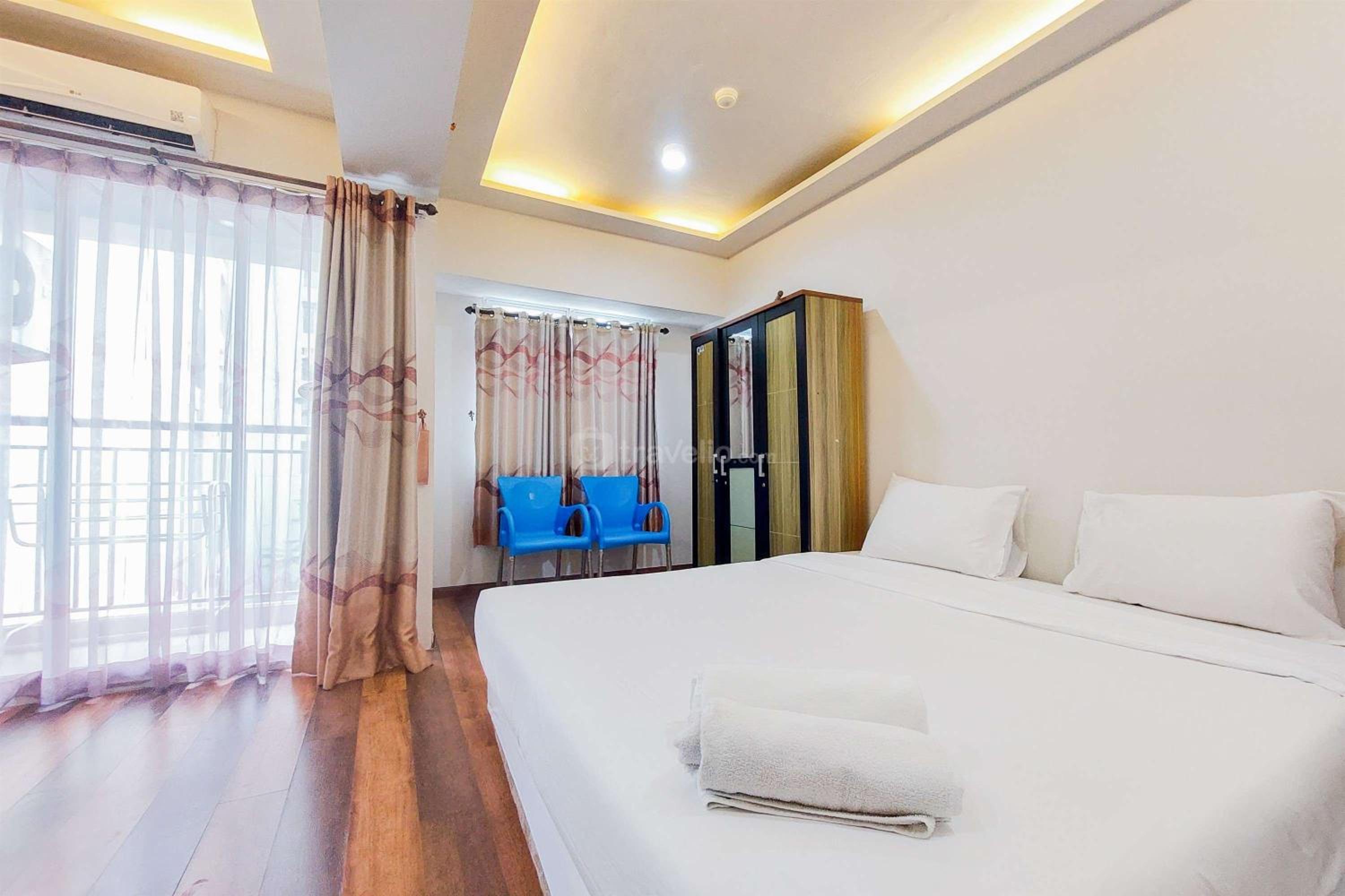 Comfy and Warm Studio Serpong Greenview Apartment By Travelio view 5