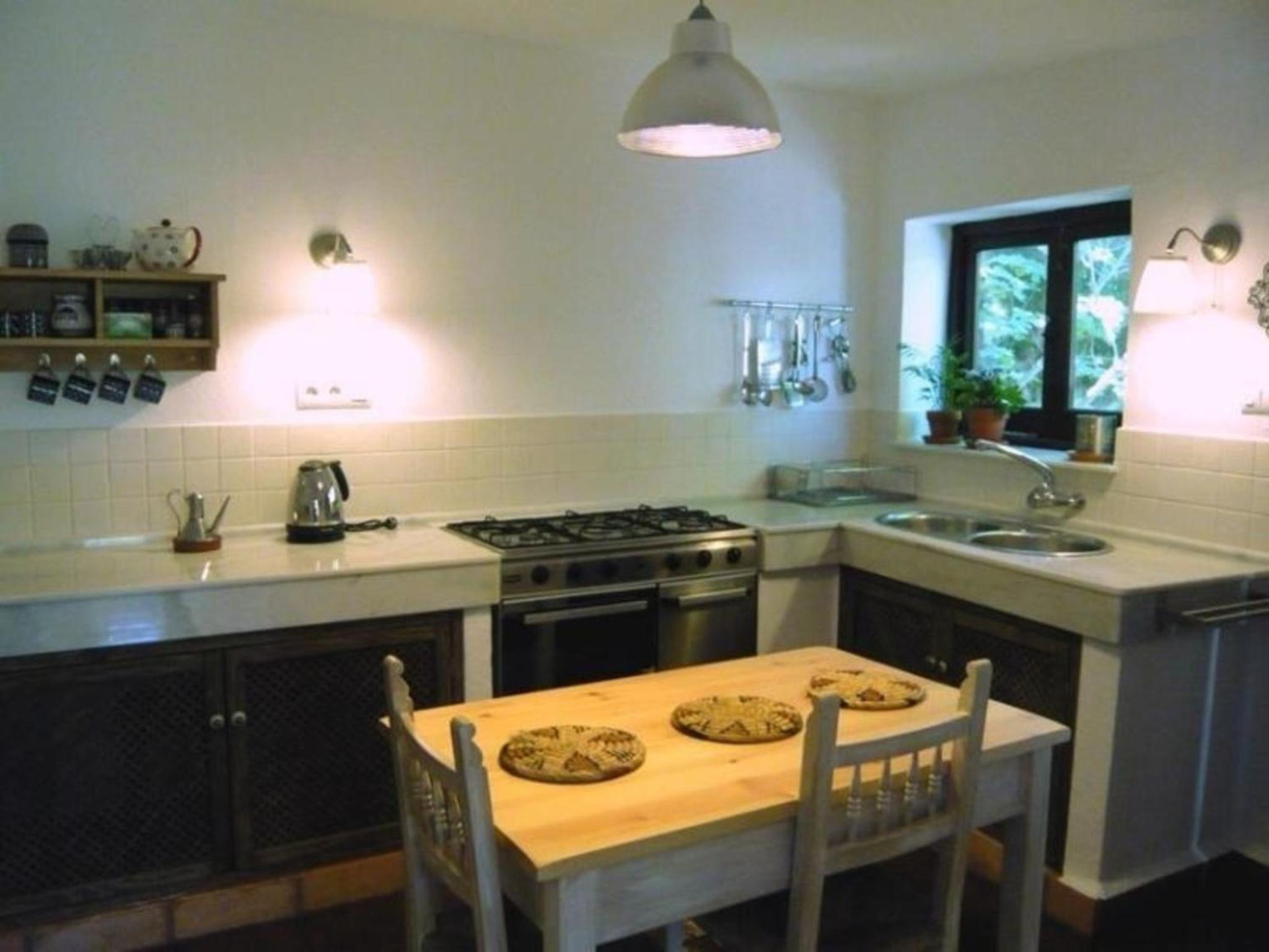 Ferienhaus mit Terrasse in der Nähe eines Wasserfalls