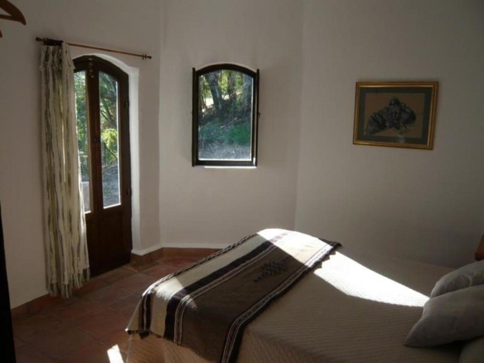 Ferienhaus mit Terrasse in der Nähe eines Wasserfalls