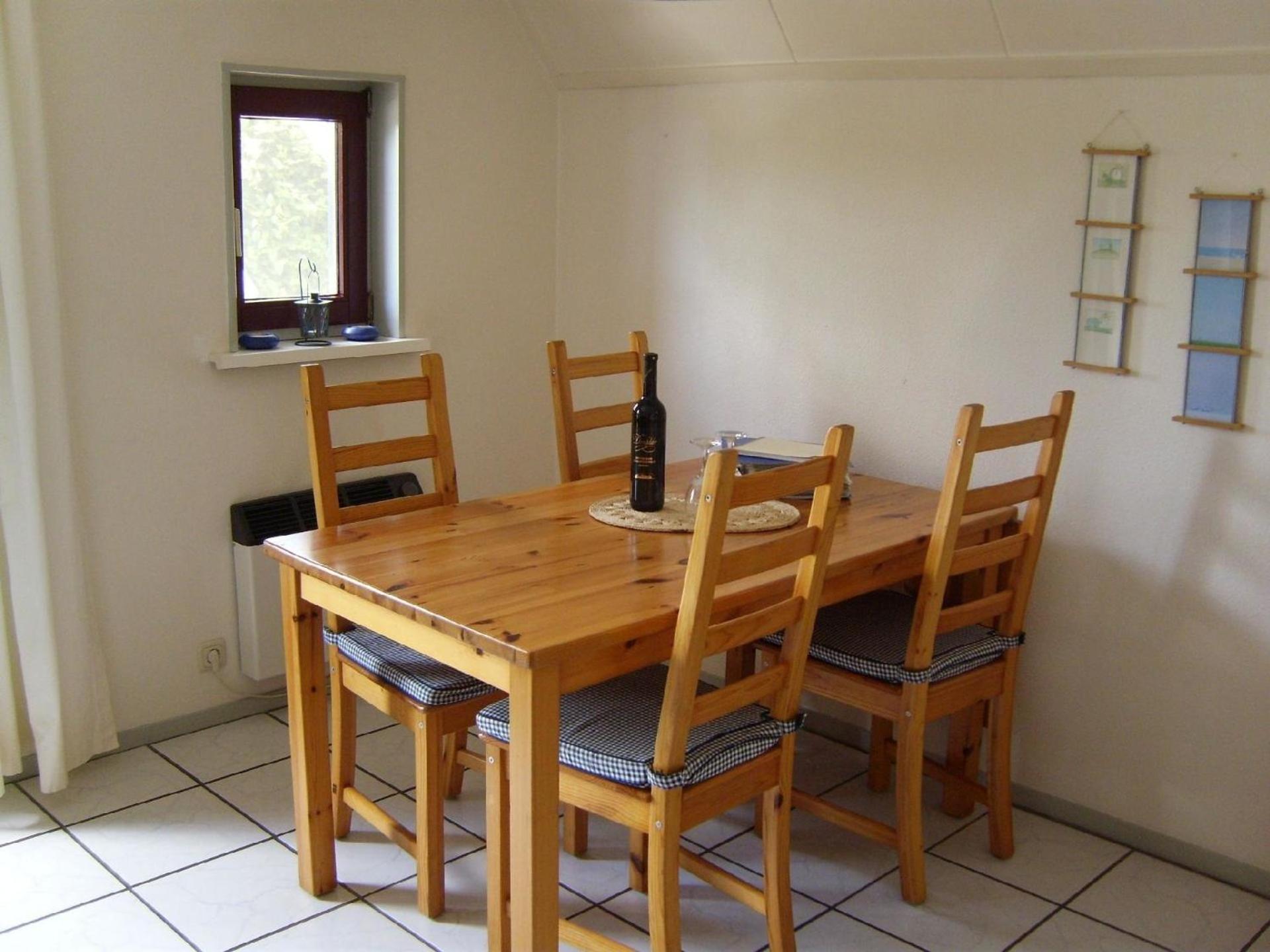 Gemütliches Ferienhaus mit Garten und einer Terrasse mit Windfang