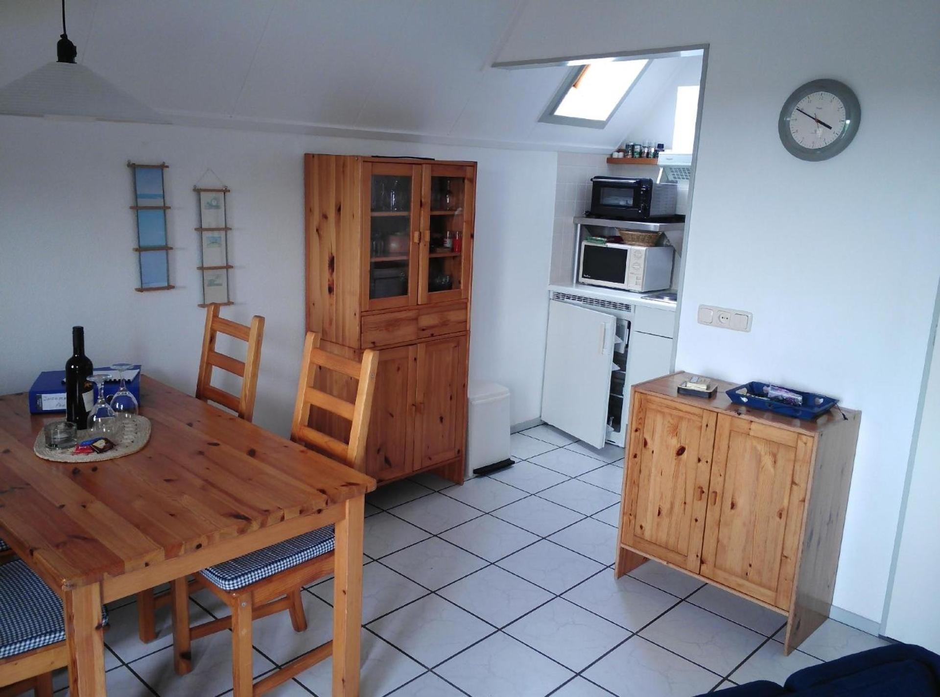Gemütliches Ferienhaus mit Garten und einer Terrasse mit Windfang