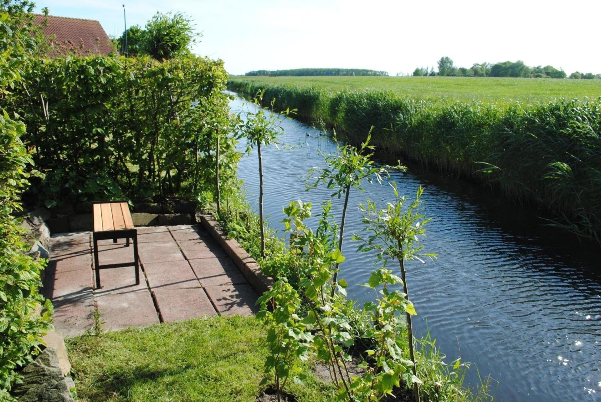Gemütliches Ferienhaus mit Garten und einer Terrasse mit Windfang