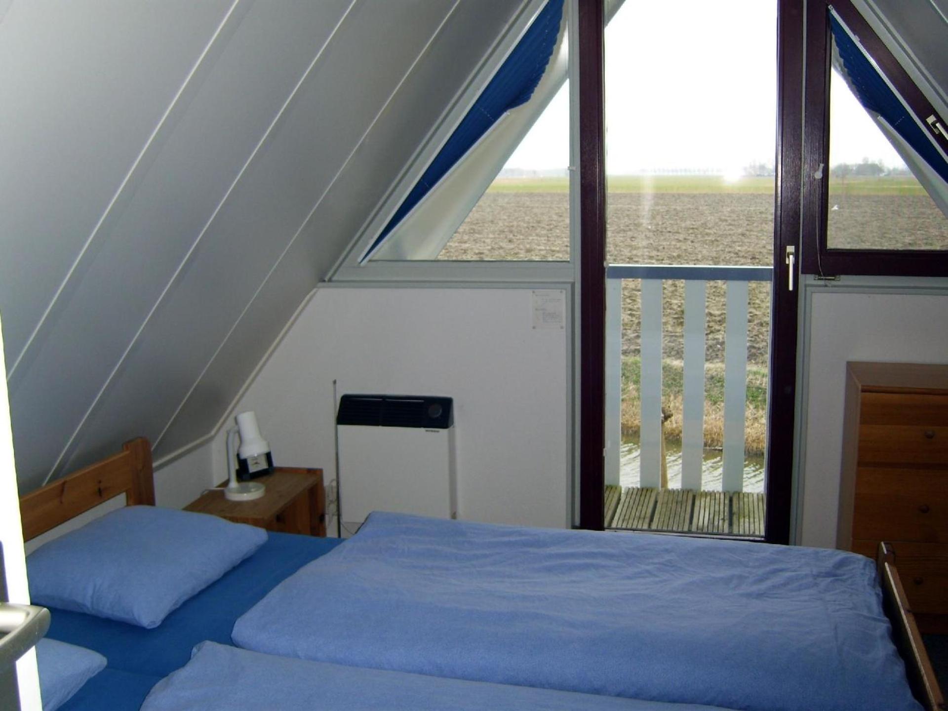 Gemütliches Ferienhaus mit Garten und einer Terrasse mit Windfang