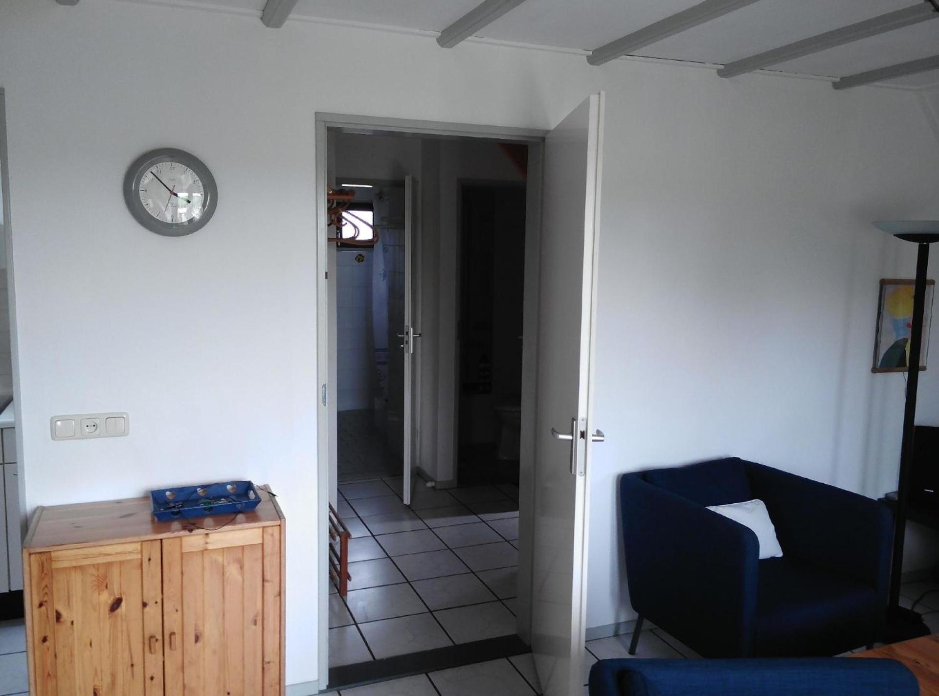 Gemütliches Ferienhaus mit Garten und einer Terrasse mit Windfang