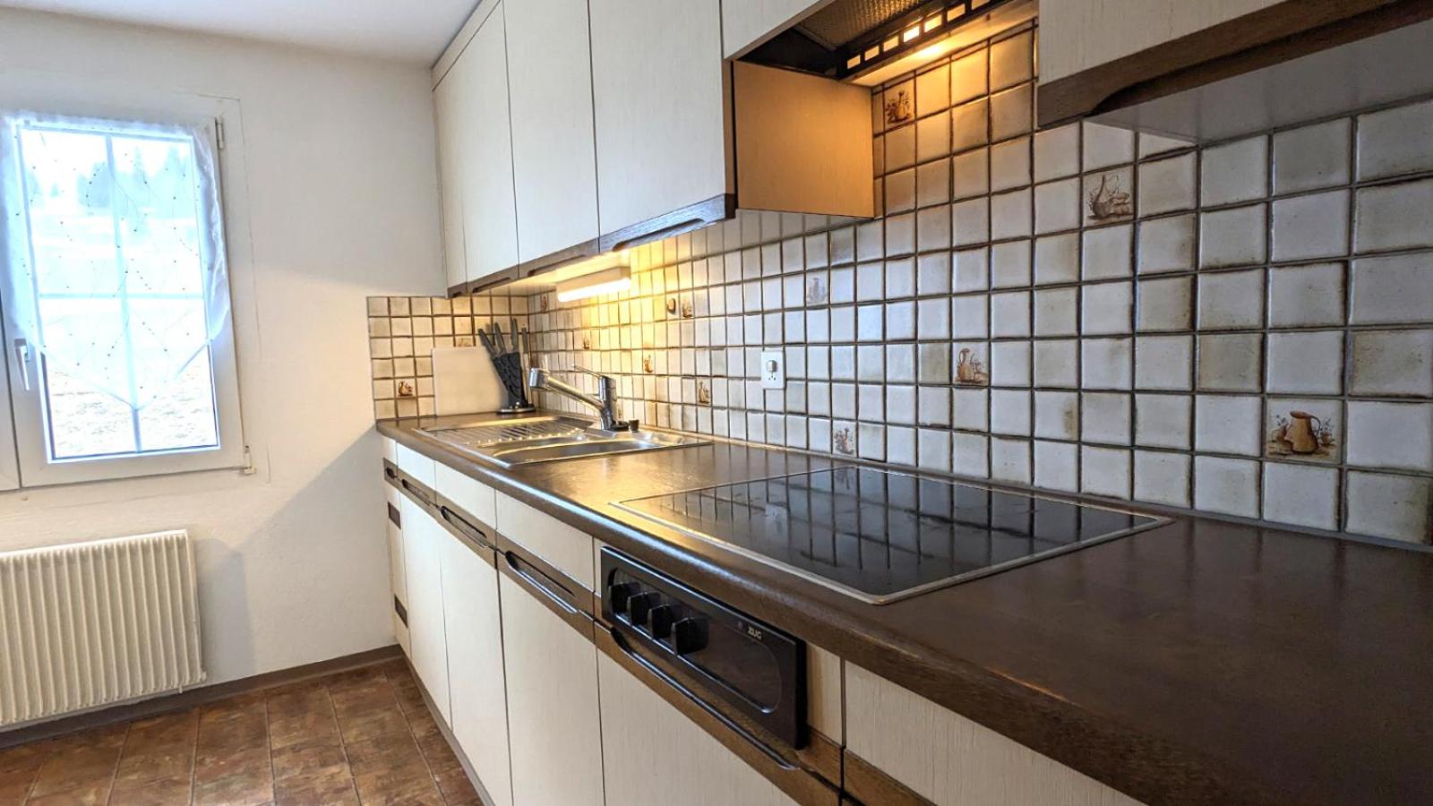 Ferienwohnung im Hotel Arvenbüel