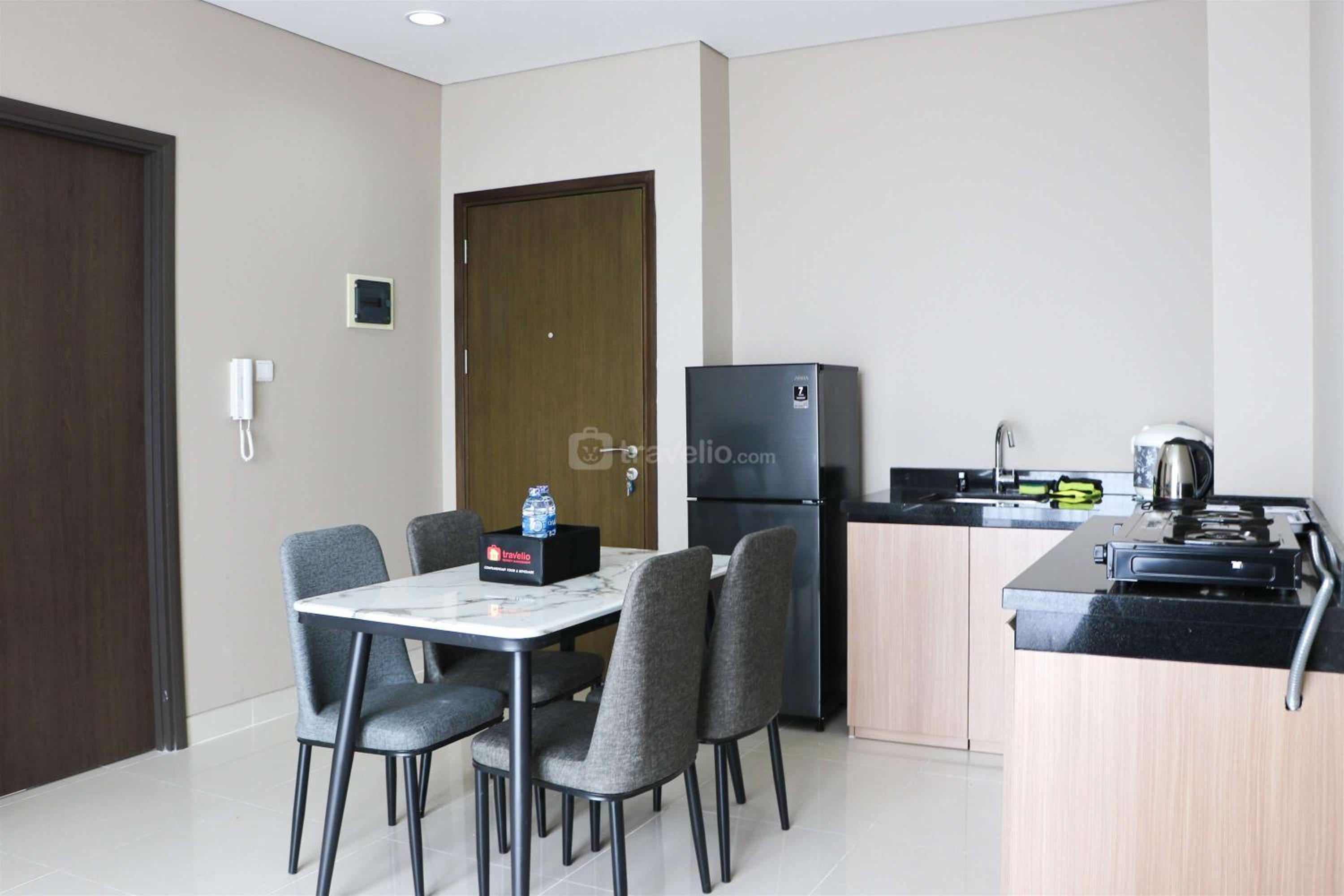 Modern and Compact Designed 1BR at Ciputra International Apartment By Travelio view 3