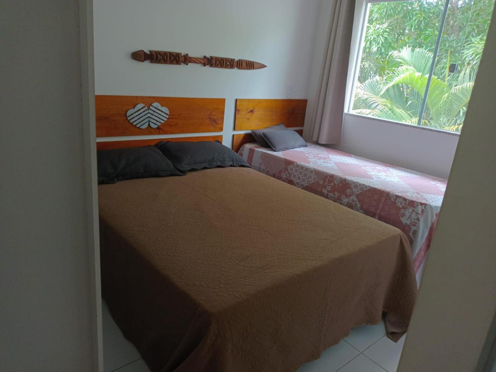 Casa para temporada 50m da praia em Condomínio 2 Suítes Ar Wi-Fi Rápida Ideal para Família
