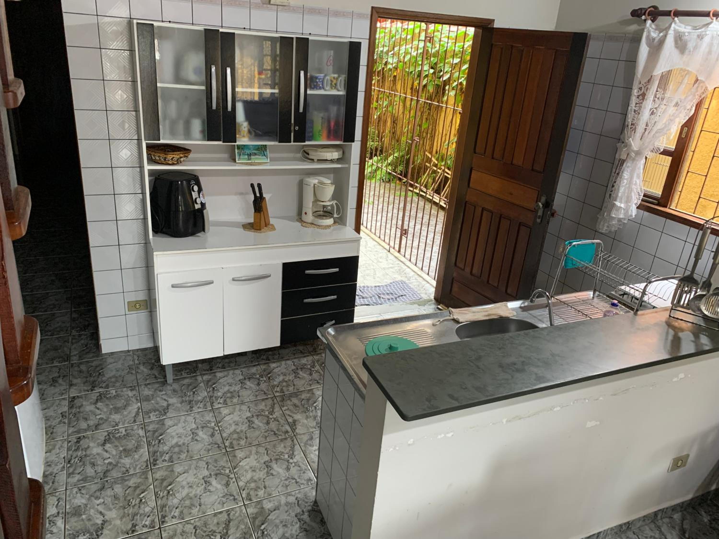 Casa confortável p 13 praia Itaguá Ubatuba