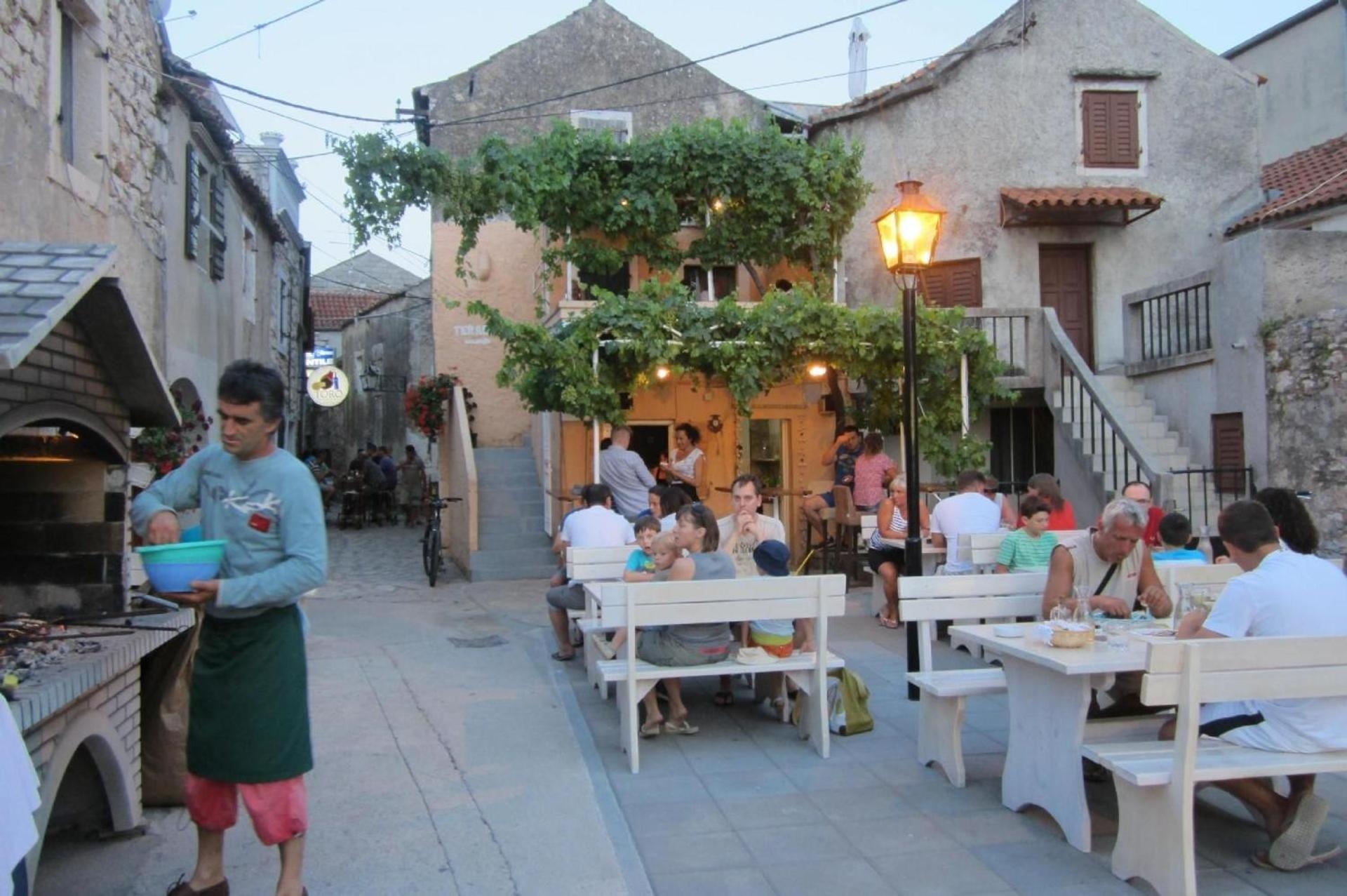 Ferienhaus mit überdachter Terrasse und Meerblick