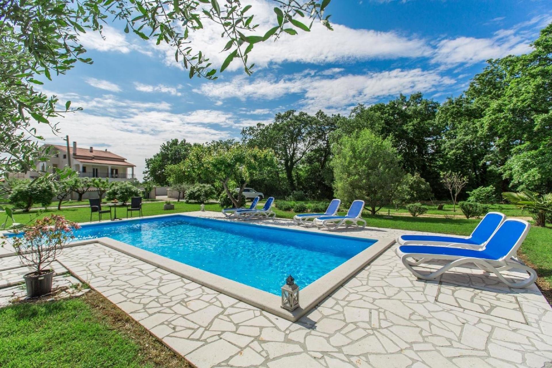 Ferienwohnung Adelia mit gemeinsamem Pool