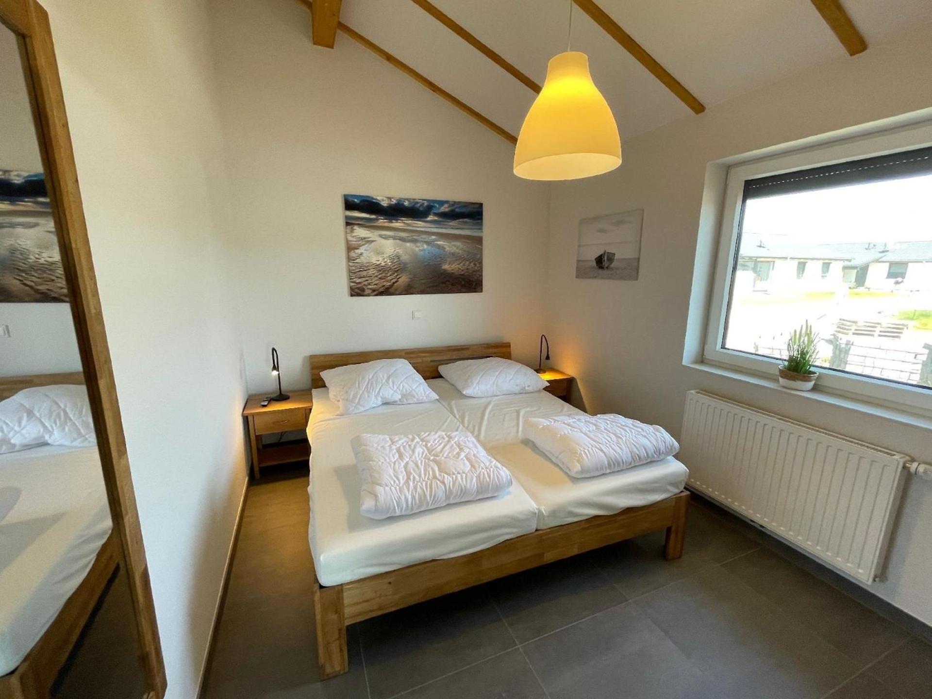 Ferienhaus mit Garten, Strandkorb und Grillkamin