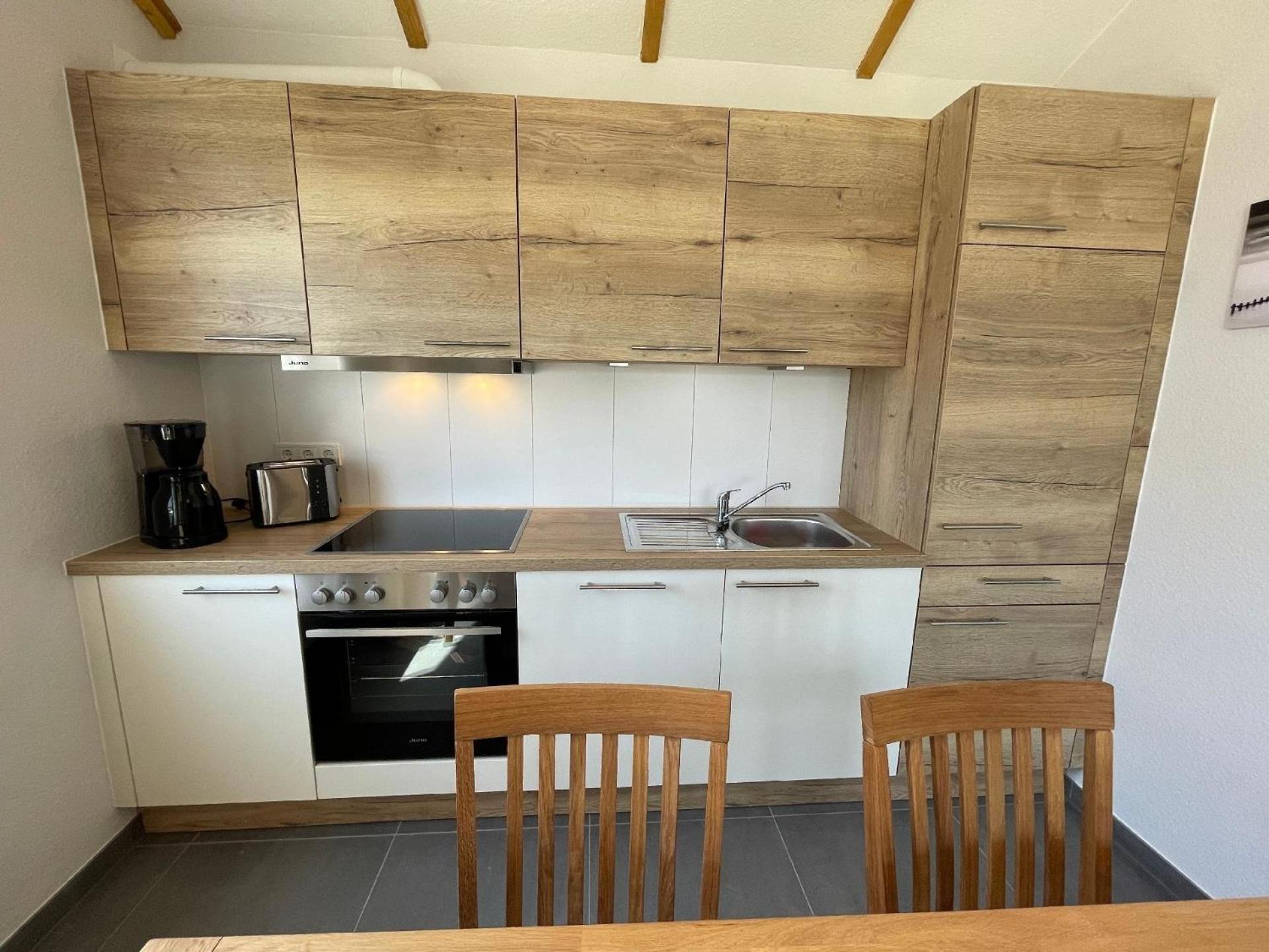 Ferienhaus mit Garten, Strandkorb und Grillkamin