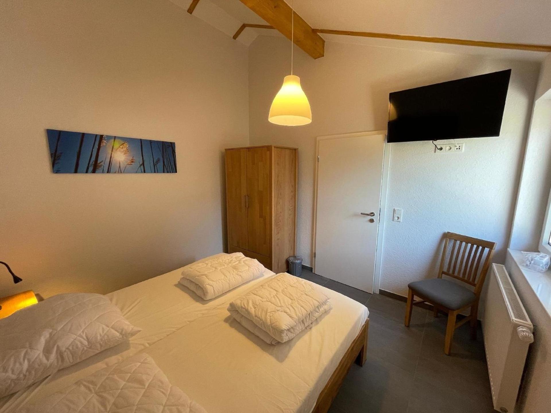 Ferienhaus mit Garten, Strandkorb und Grillkamin