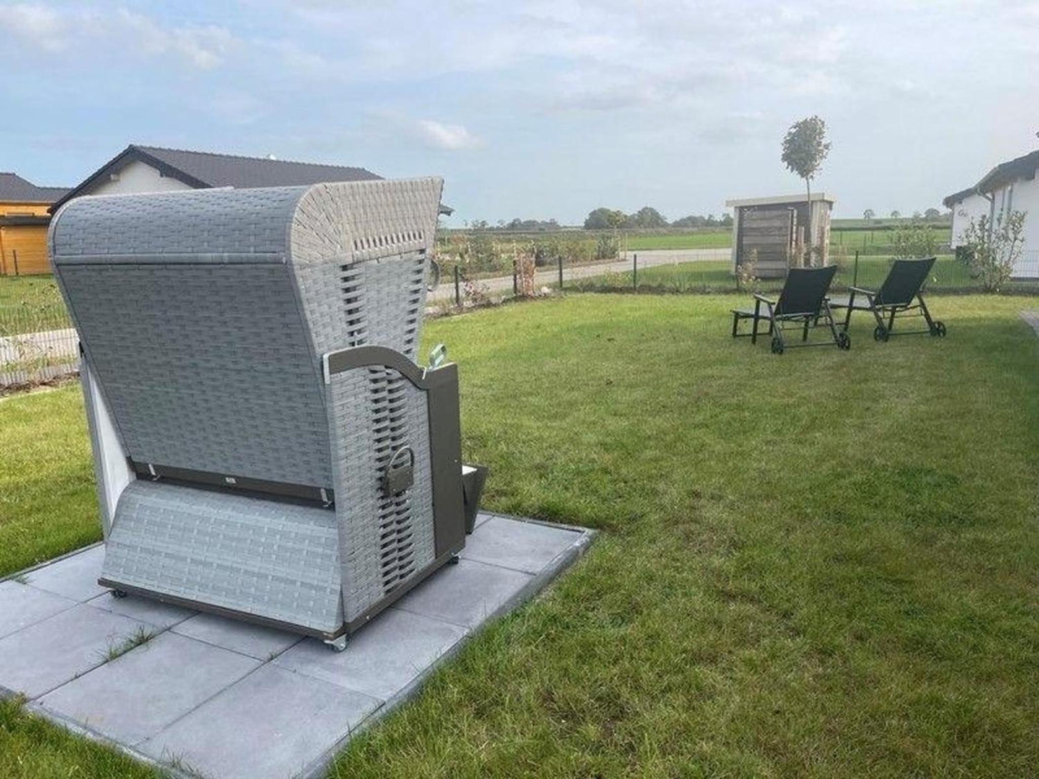 Ferienhaus mit Garten, Strandkorb und Grillkamin