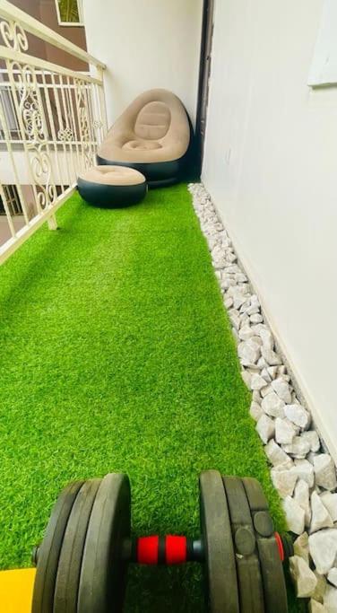Luxury Oasis 2 - Entire 2 Bedroom Apartment in Abuja with Pool, Gym, WiFi, Balcony, and Garden view 3