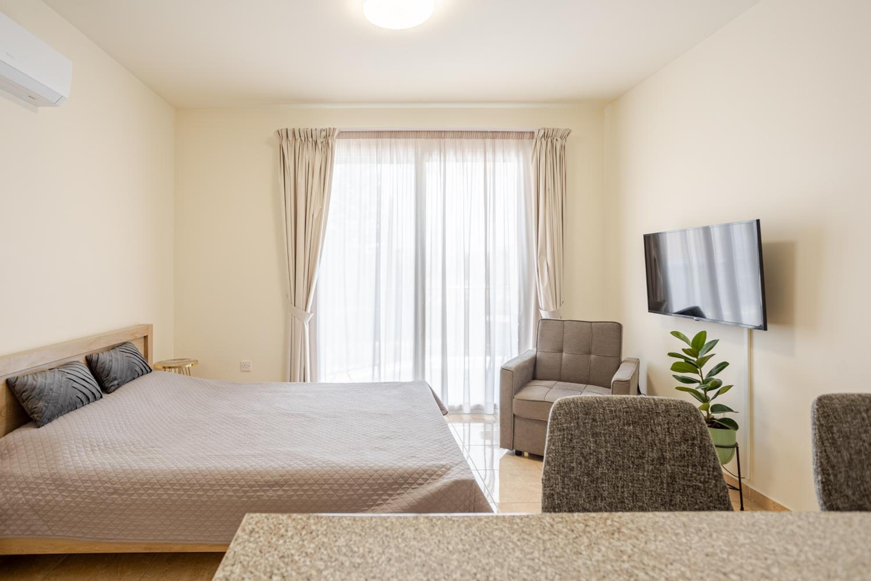 Danaos Seaside Suite 103 with Pool in Tourist Area