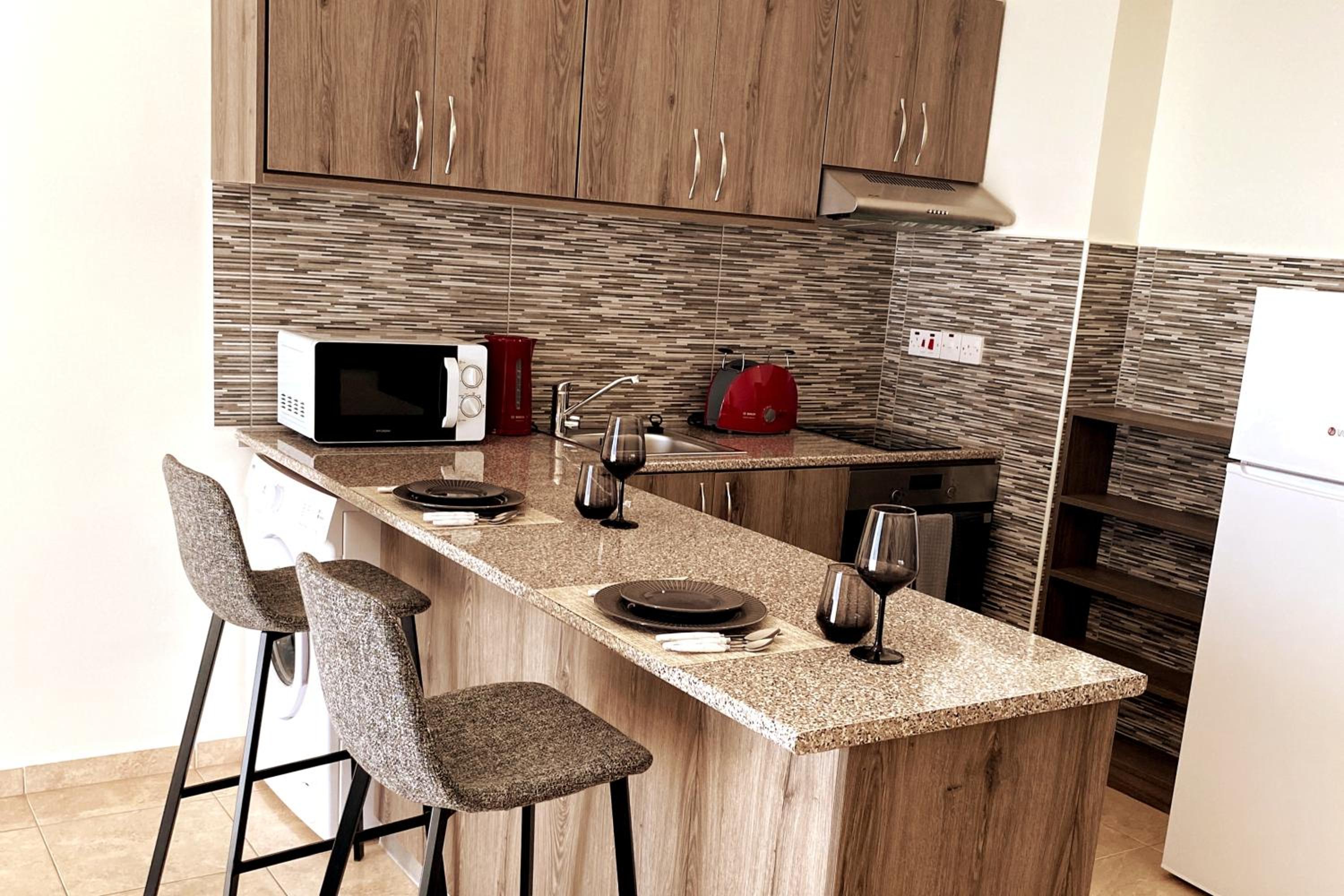 Danaos Seaside Suite 103 with Pool in Tourist Area