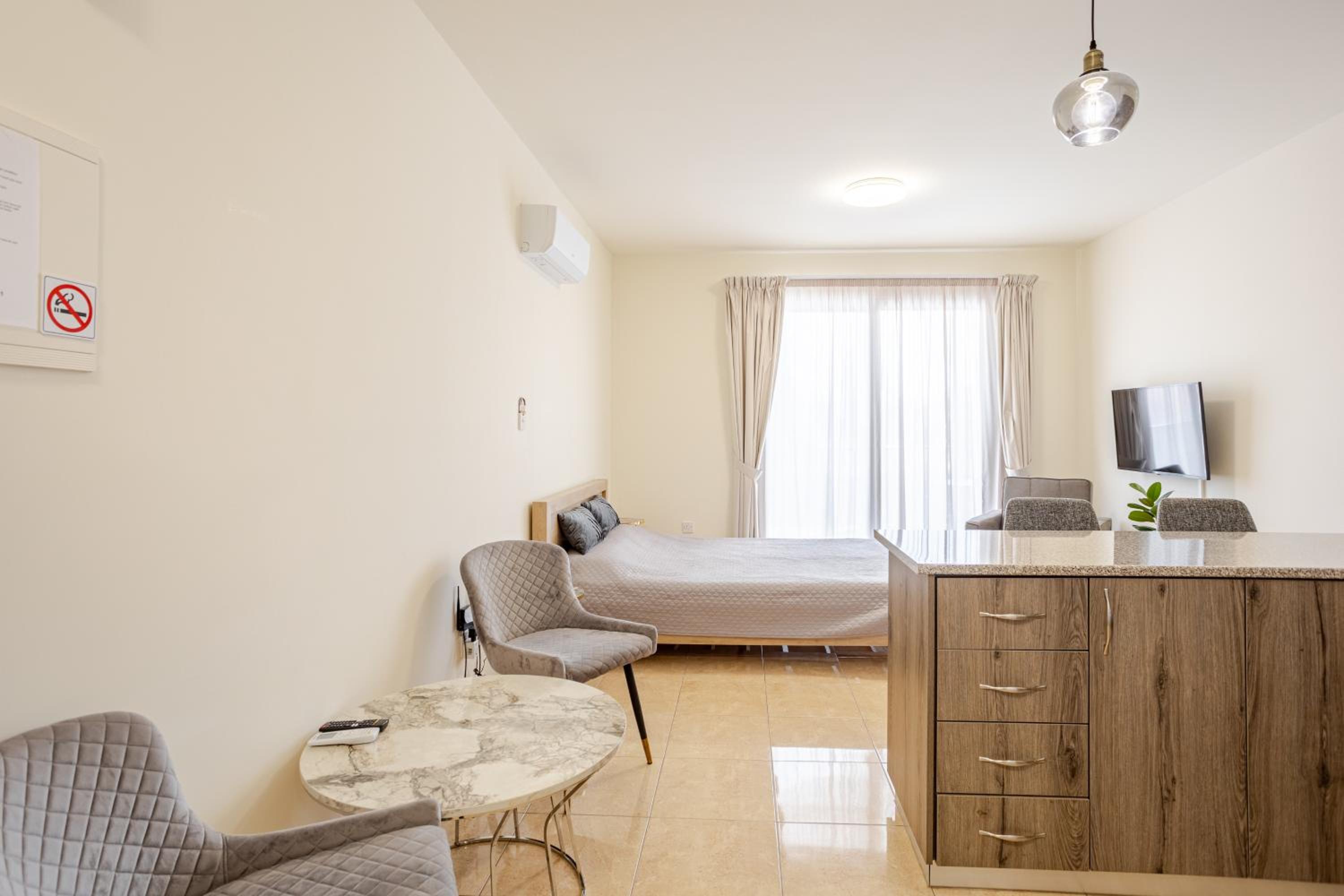 Danaos Seaside Suite 103 with Pool in Tourist Area