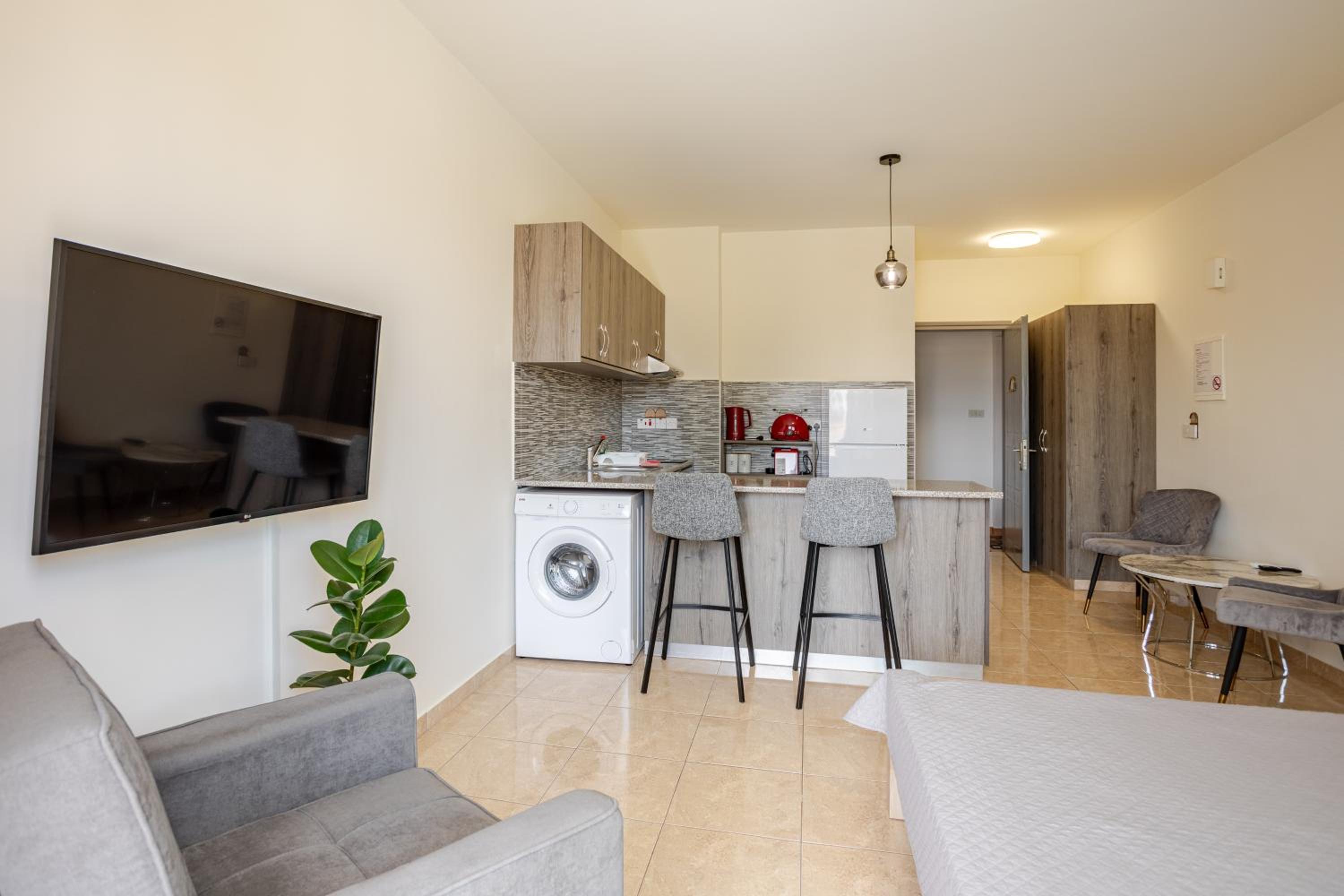 Danaos Seaside Suite 103 with Pool in Tourist Area