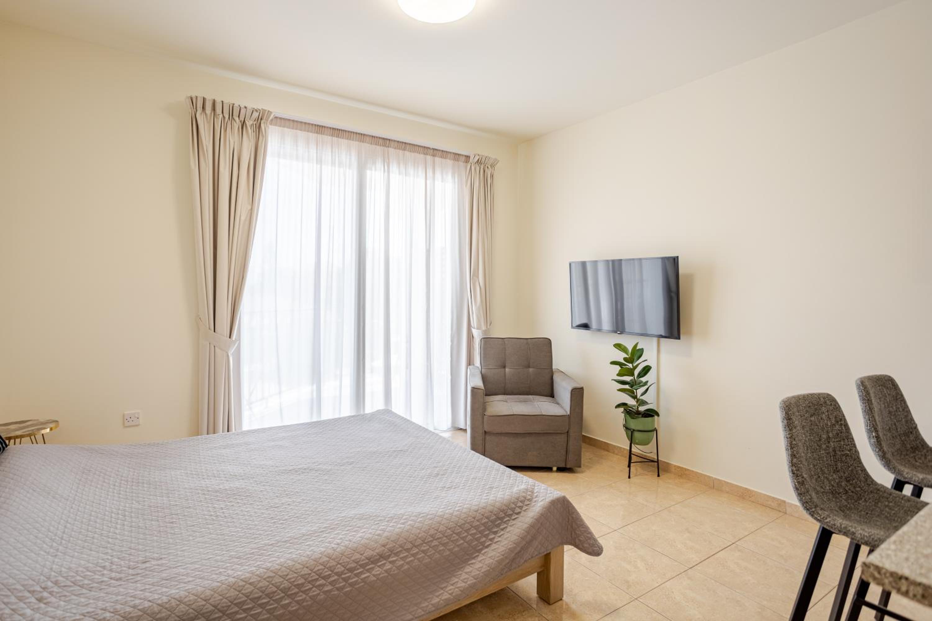 Danaos Seaside Suite 103 with Pool in Tourist Area