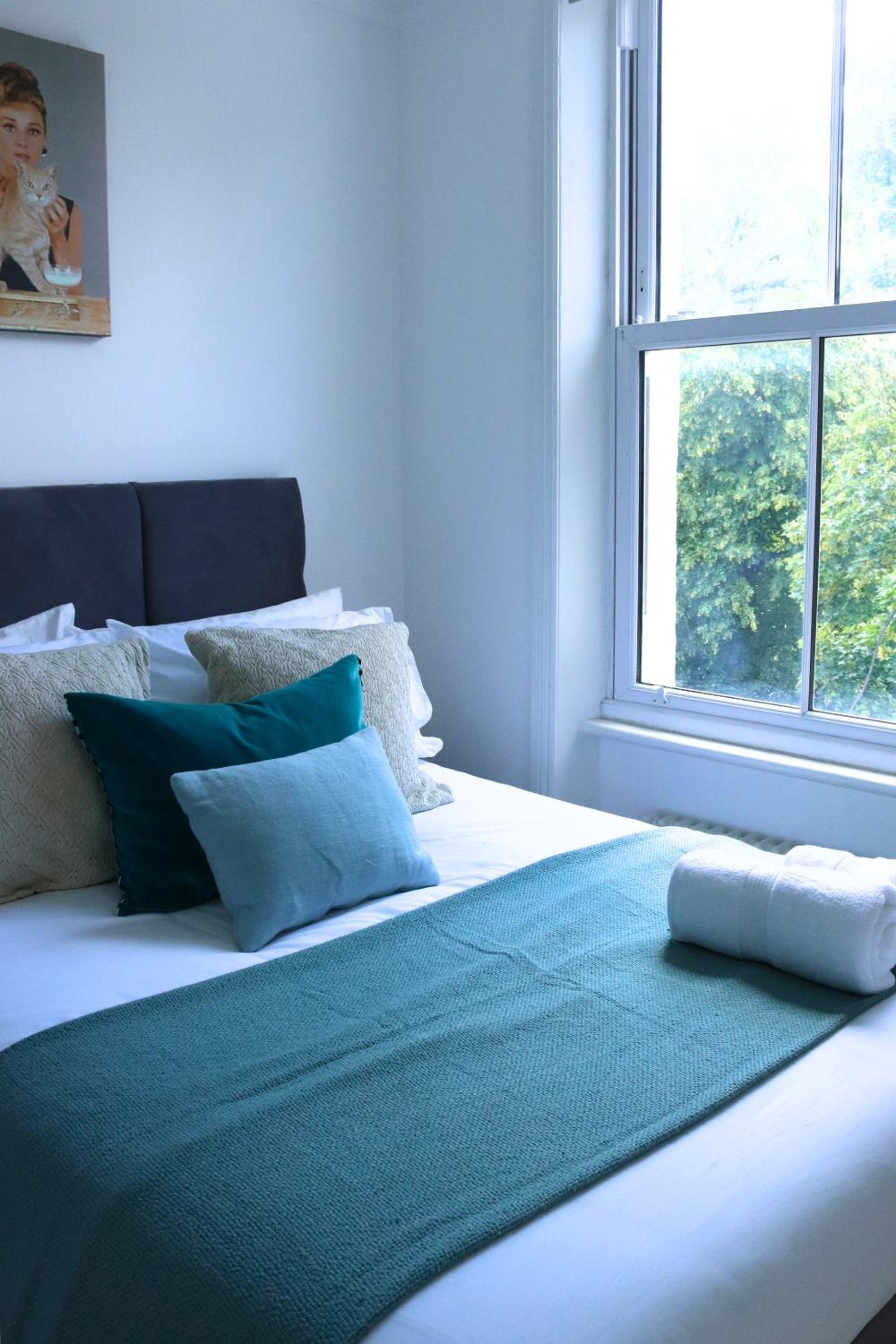 Stylish 2BR Chelsea Penthouse with Private Rooftop