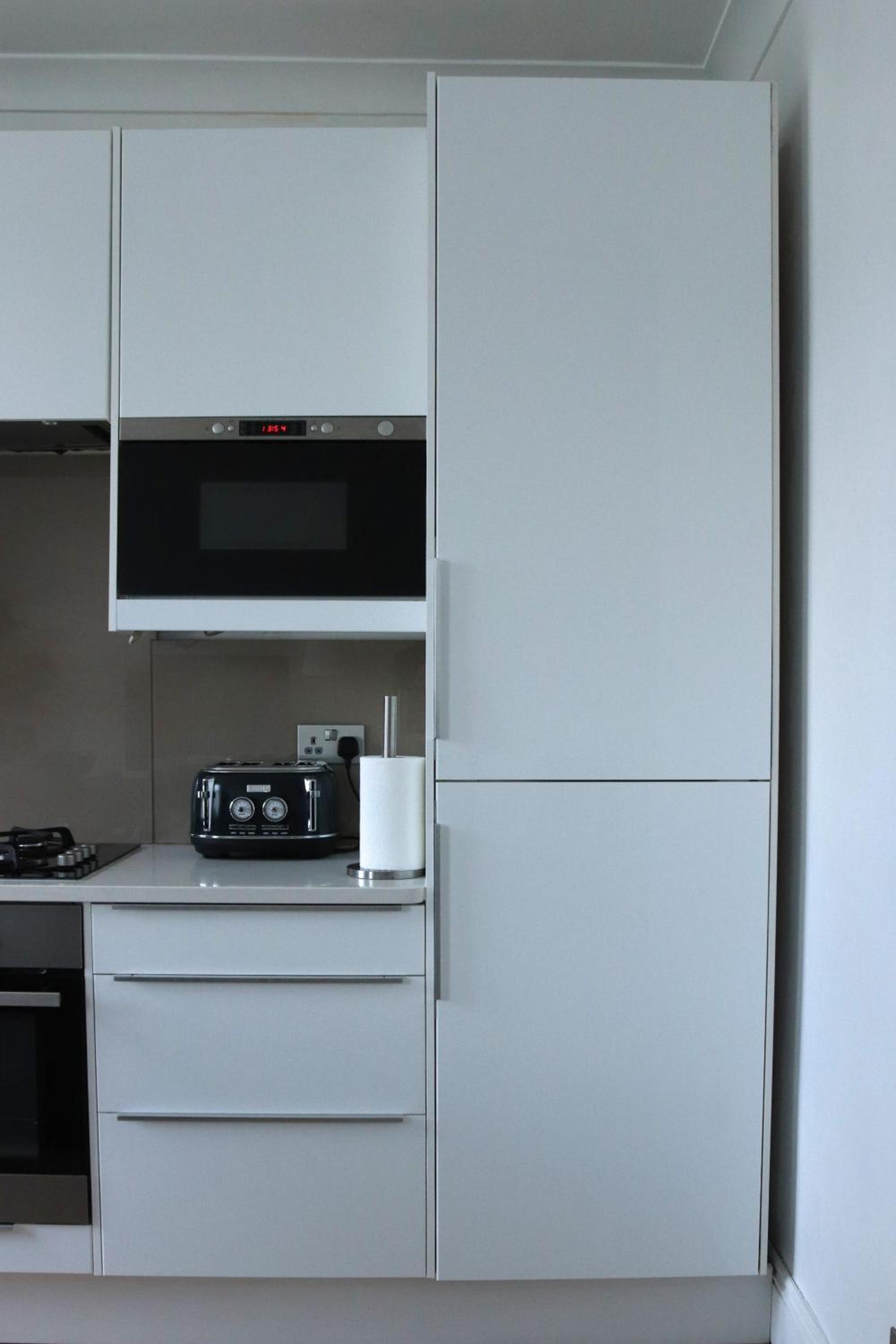 Stylish 2BR Chelsea Penthouse with Private Rooftop