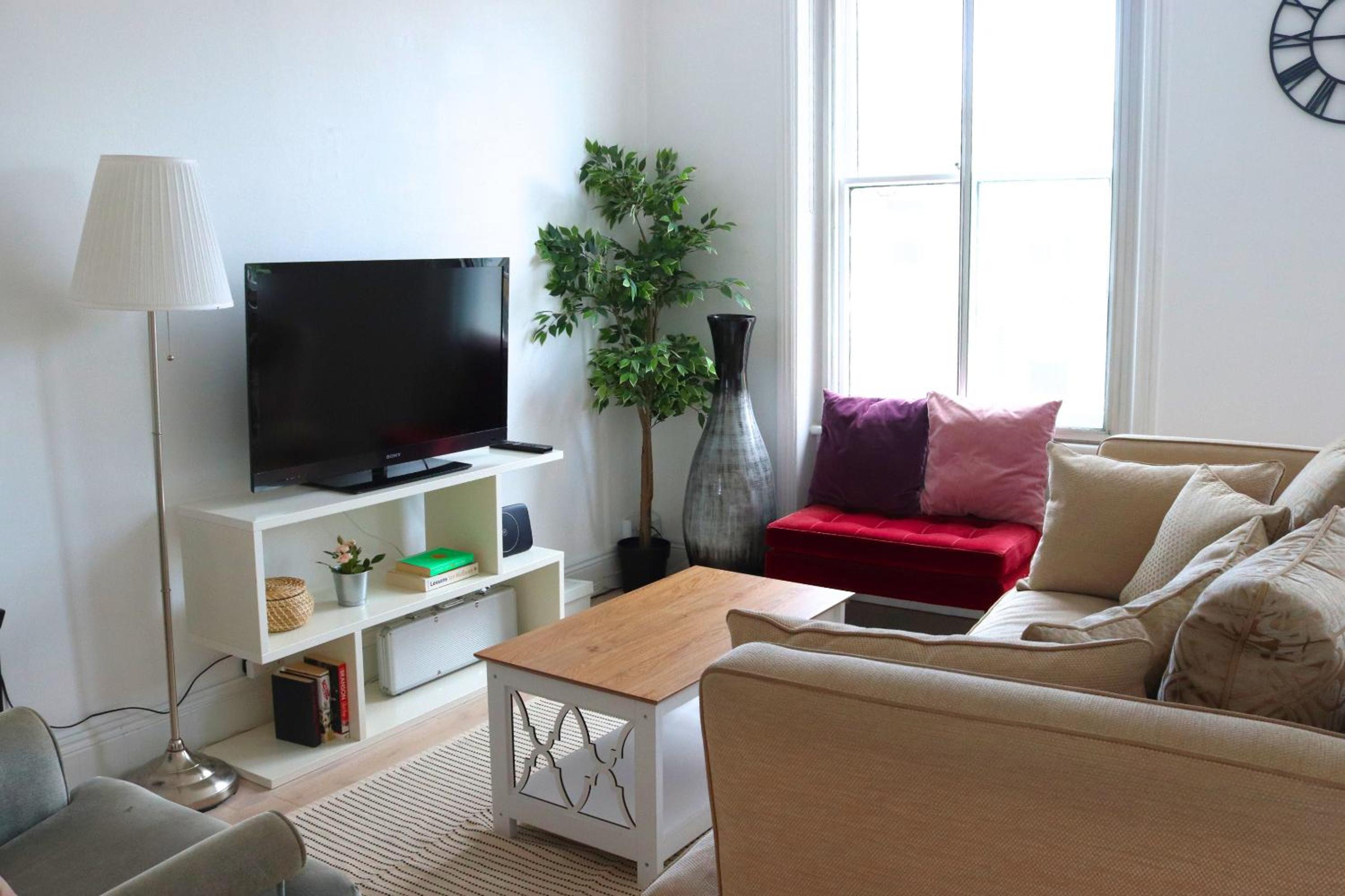 Stylish 2BR Chelsea Penthouse with Private Rooftop