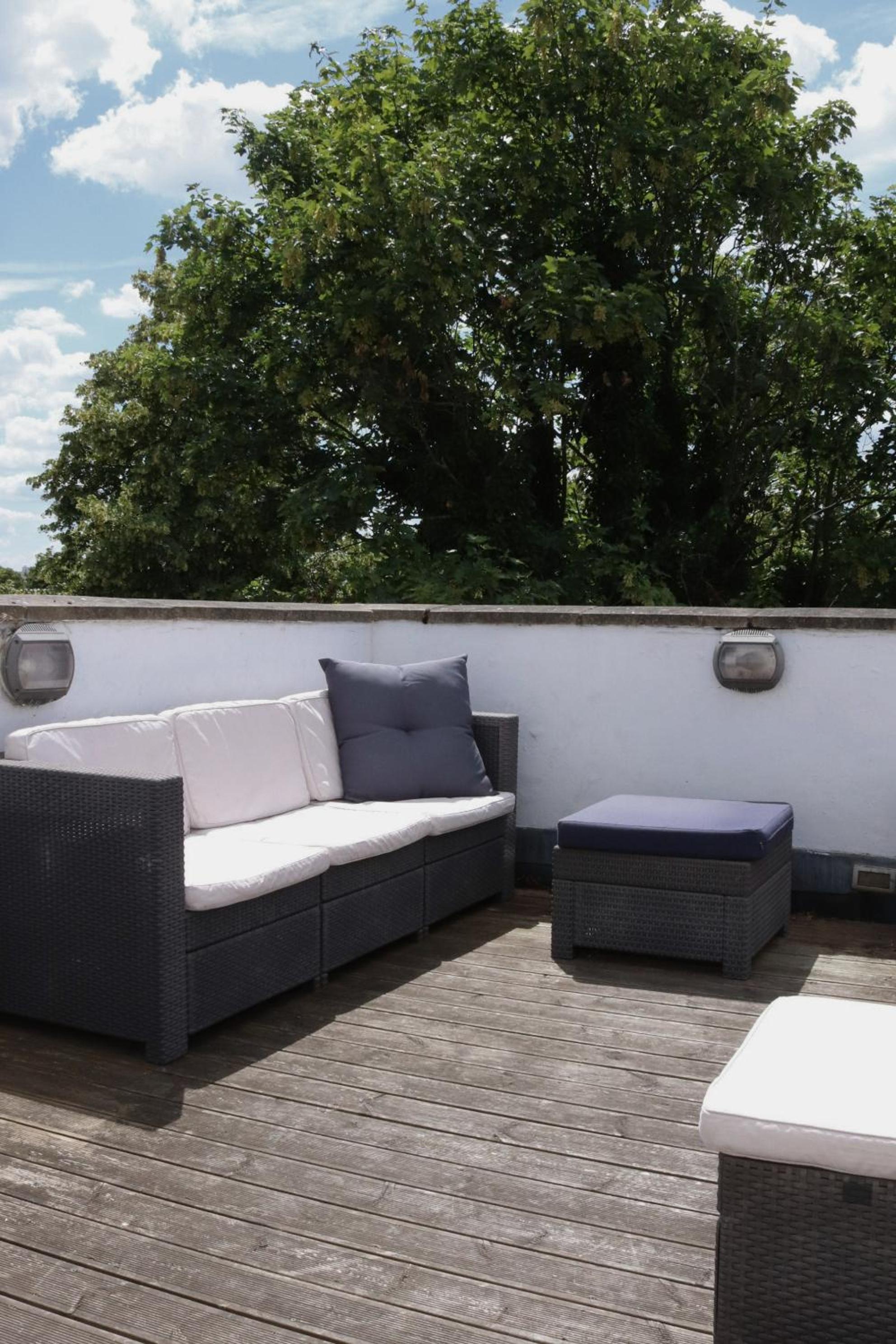 Stylish 2BR Chelsea Penthouse with Private Rooftop
