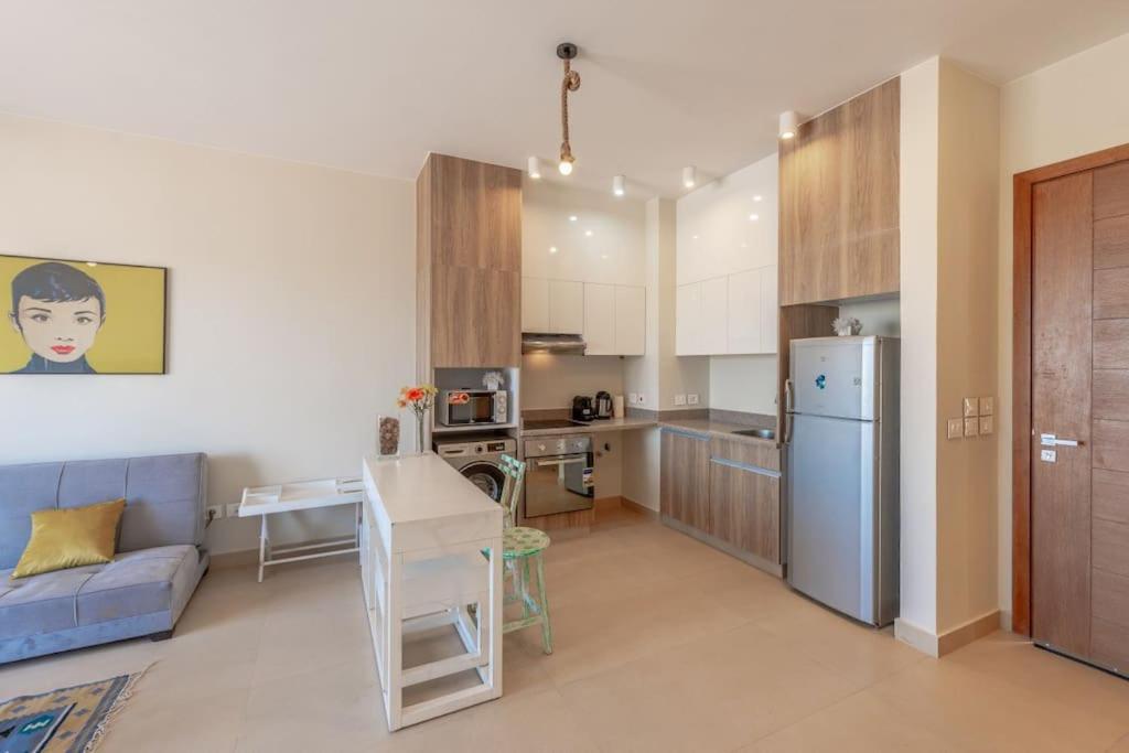 Sunny 1BR Retreat Newest Project Shedwan El Gouna Lagoon & Pool view 5