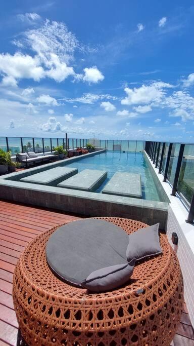 Flat charmoso a beira mar no Get One