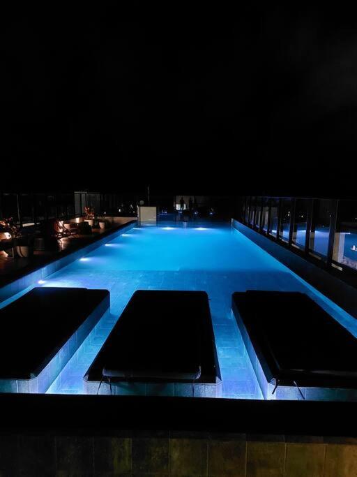 Flat charmoso a beira mar no Get One