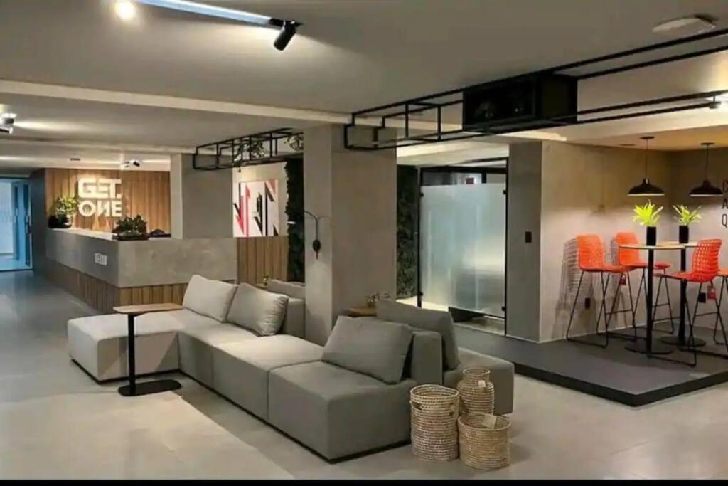 Flat charmoso a beira mar no Get One
