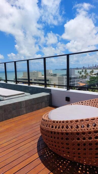 Flat charmoso a beira mar no Get One