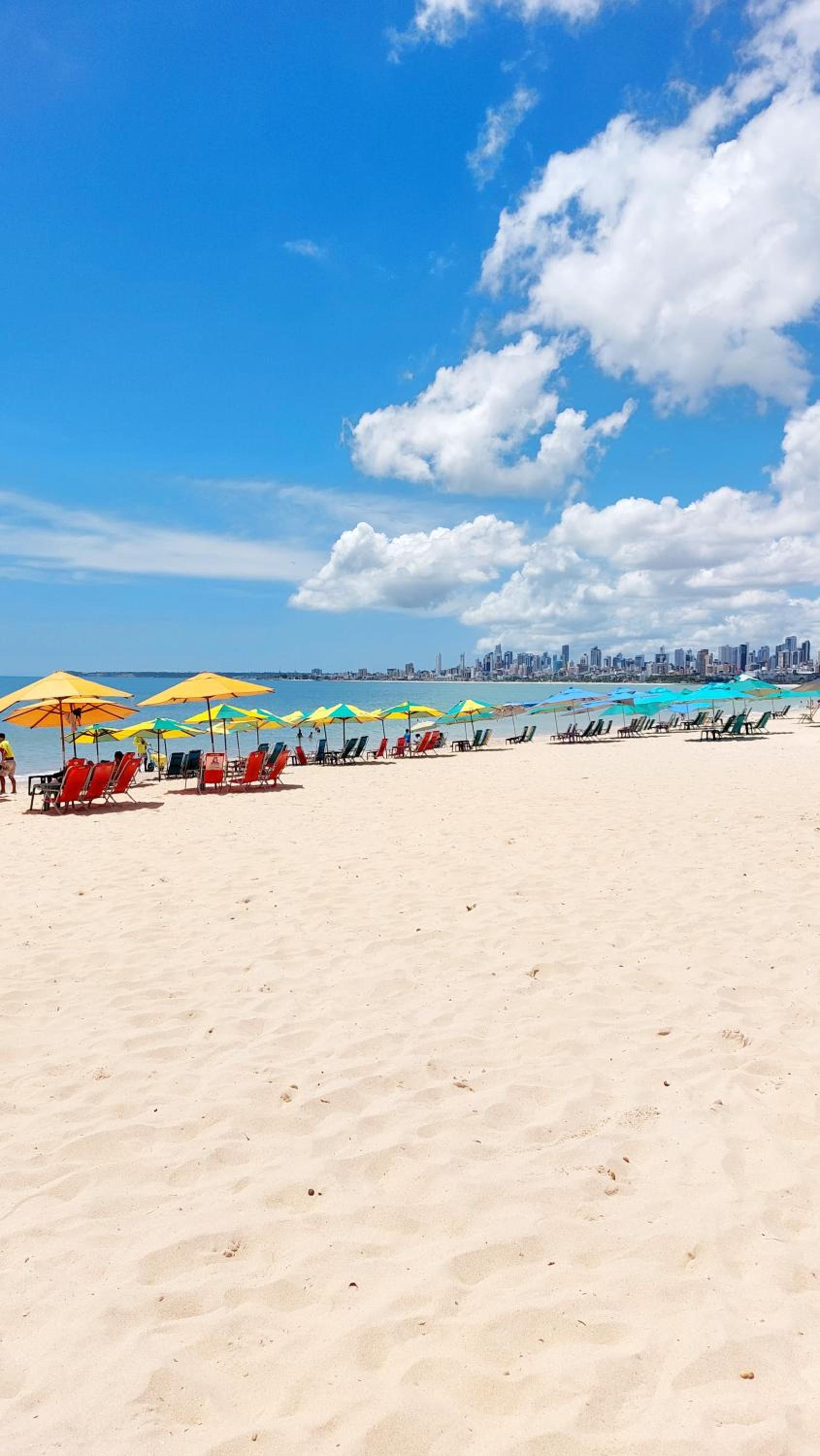 Flat charmoso a beira mar no Get One