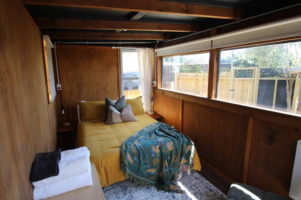 Delightful 1 bedroomed tiny house with sauna view 2