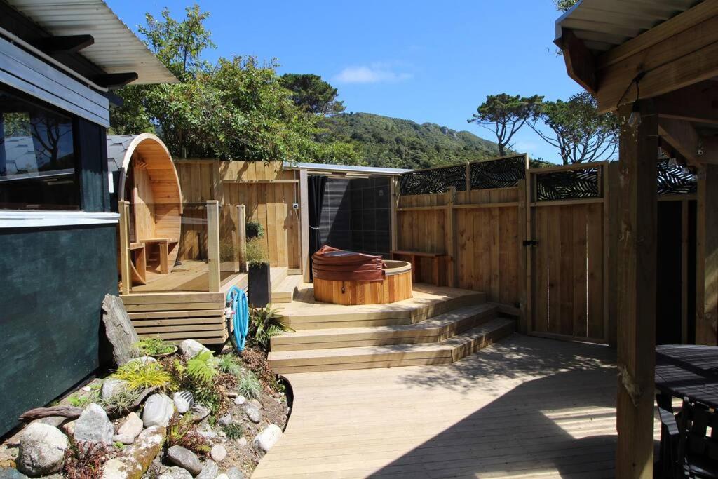 Delightful 1 bedroomed tiny house with sauna view 3