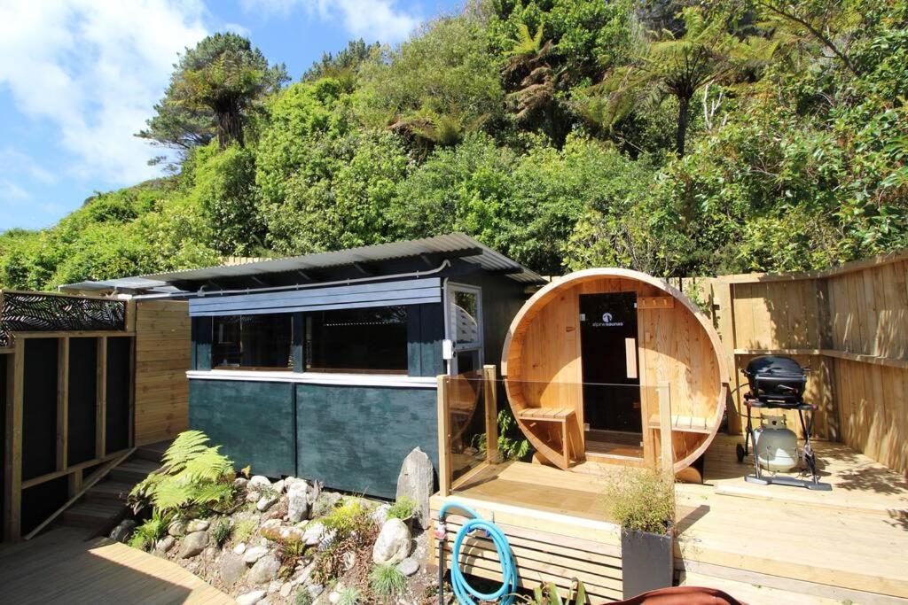 Delightful 1 bedroomed tiny house with sauna view 5