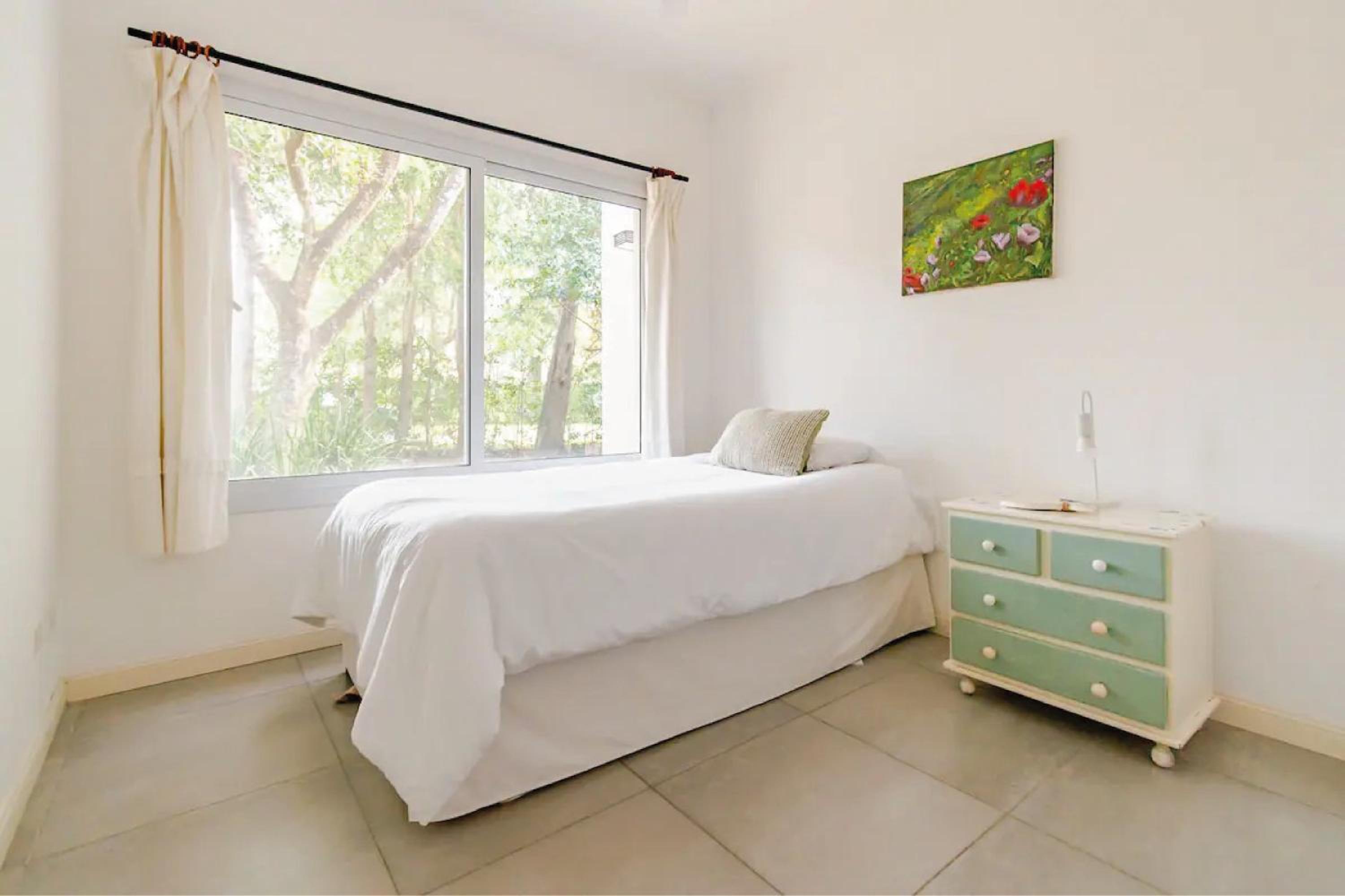 Casa tranquila cerca del Hospital Austral IAE piscina climatizada