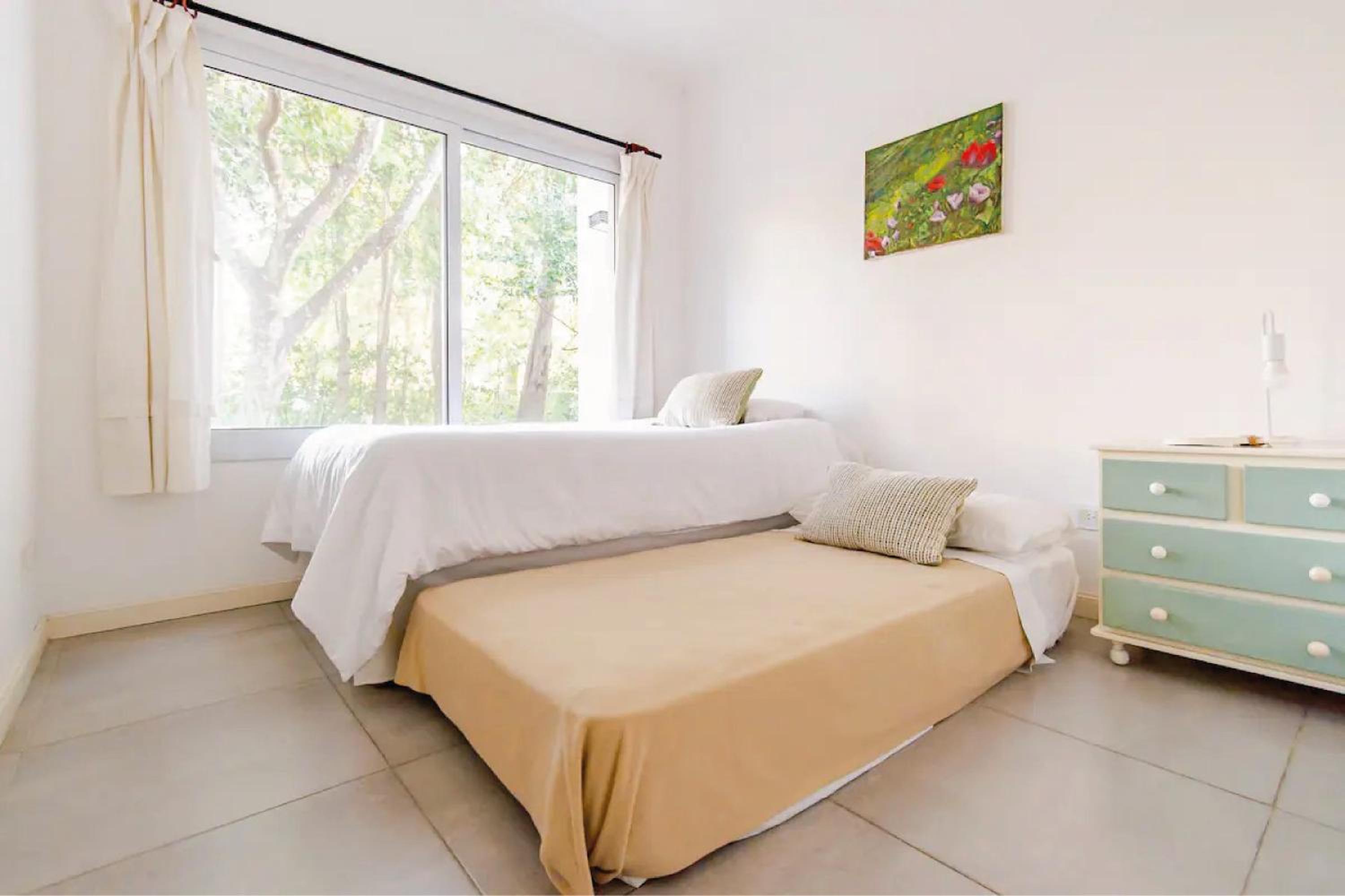 Casa tranquila cerca del Hospital Austral IAE piscina climatizada