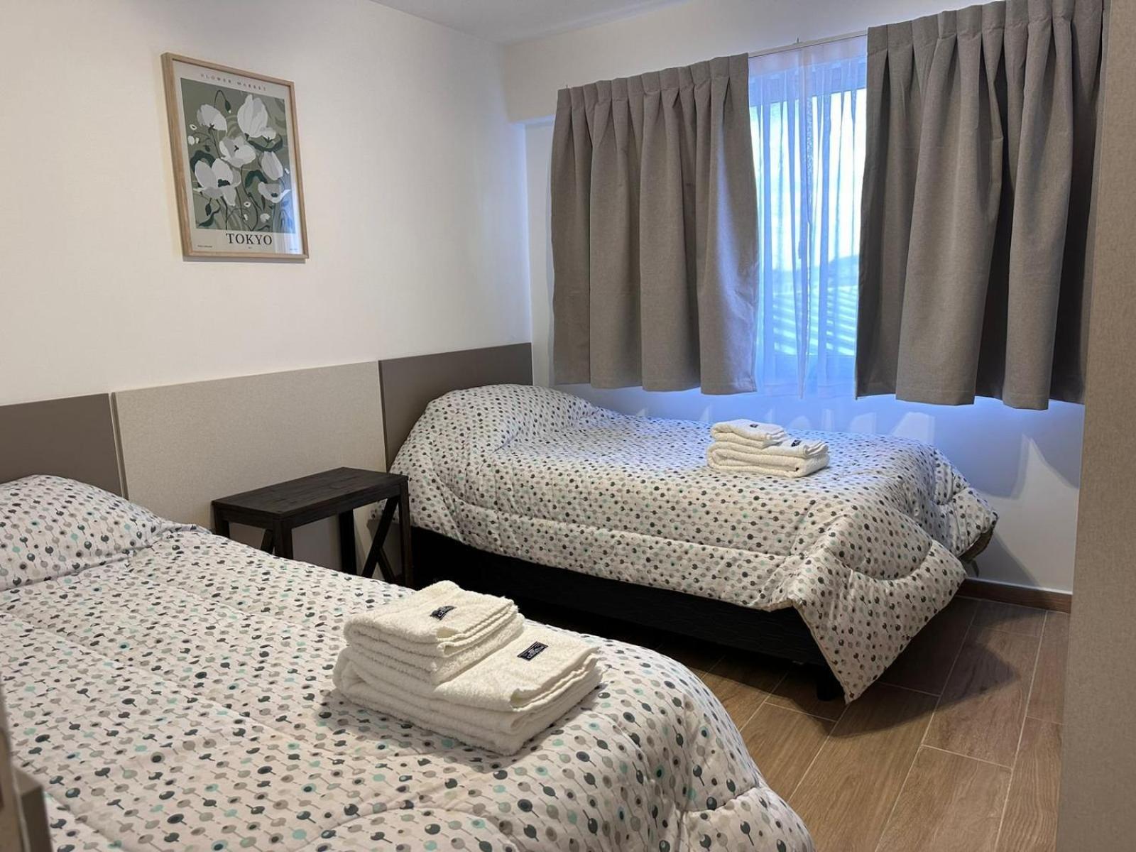 Aunaisin - Apartamentos 9 de julio 52